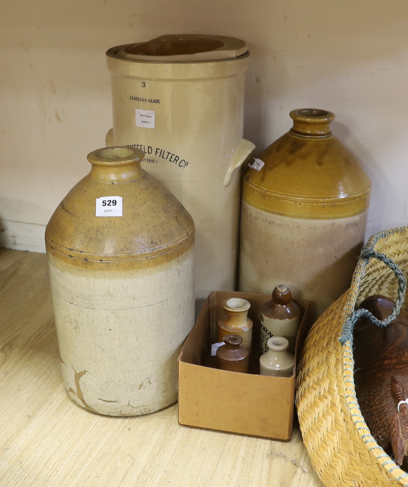 A Victorian stoneware filter - "The Berkefield Filter", two earthenware jars and a collection of stoneware ink bottles                                                                                                      