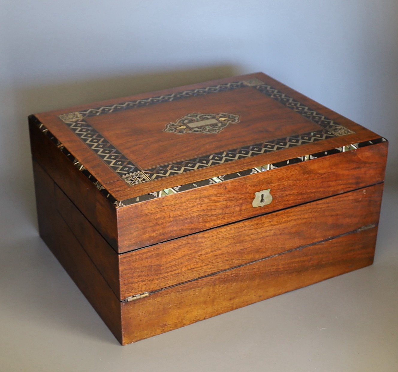 A 19 century mahogany and mother of pearl inlaid writing slope, 36cms wide x 18cms high                                                                                                                                     