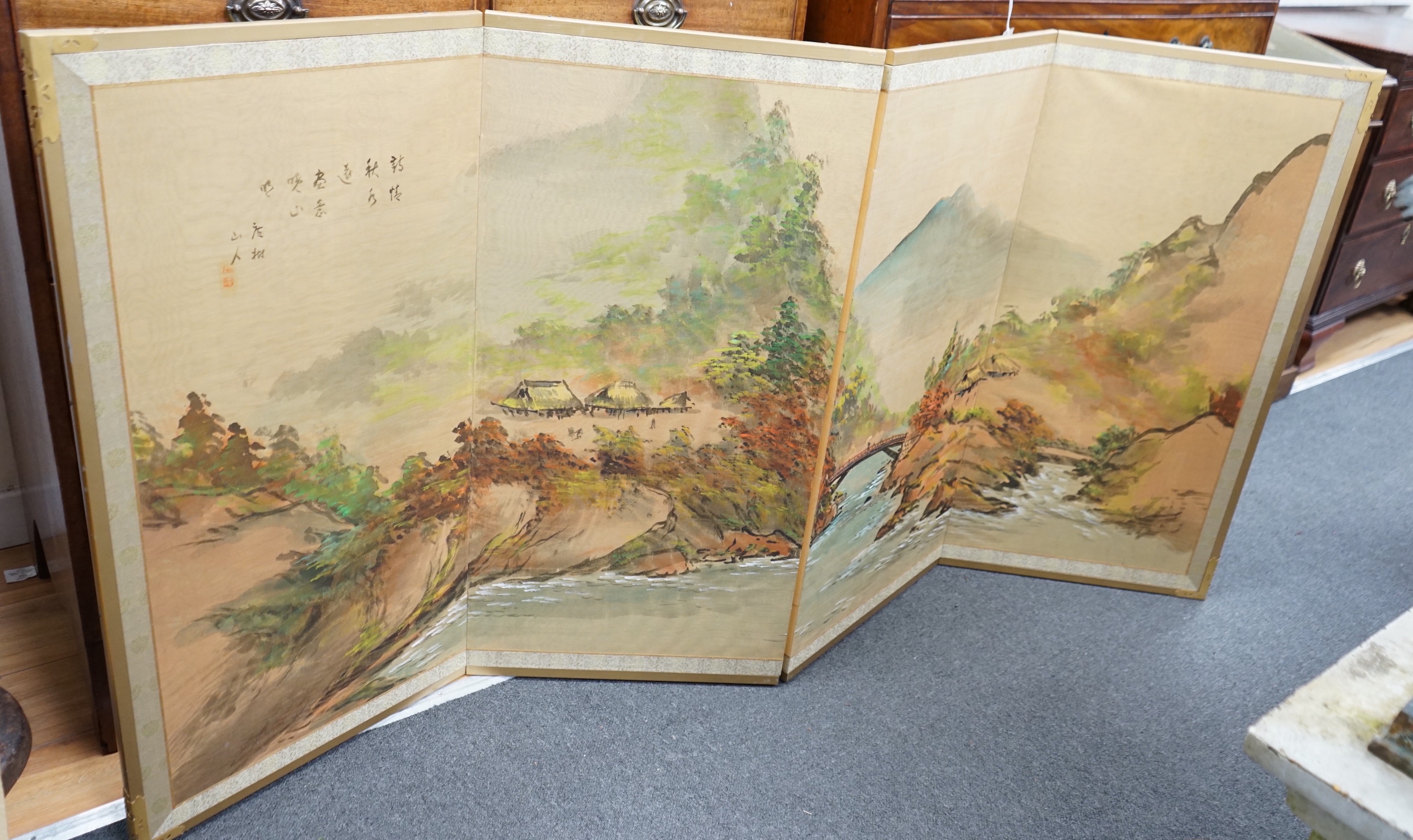A Chinese painted four fold low screen, each panel width 46cm, height 91cm                                                                                                                                                  