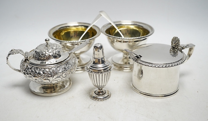 A pair of George III silver salts, London 1799, 240g, a George IV silver mustard pot, London 1822, 116g, a Victorian silver drum mustard pot, by Edward John and William Barnard, London 1850, four various mustard ladles (