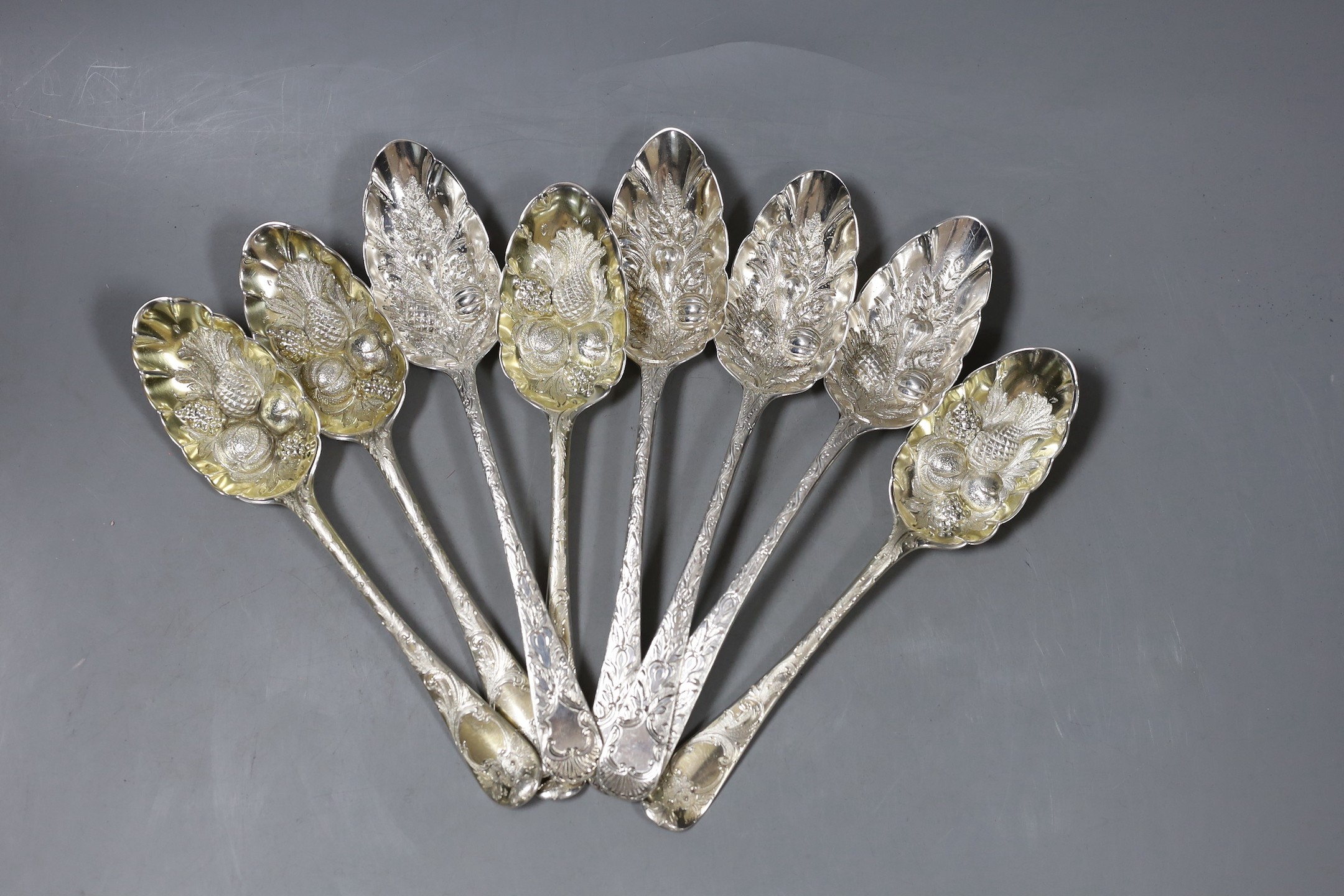 A set of four George III silver 'berry' spoons, by Eley & Fearn, London, 1805 and four earlier silver 'berry' spoons, marks pinched                                                                                         