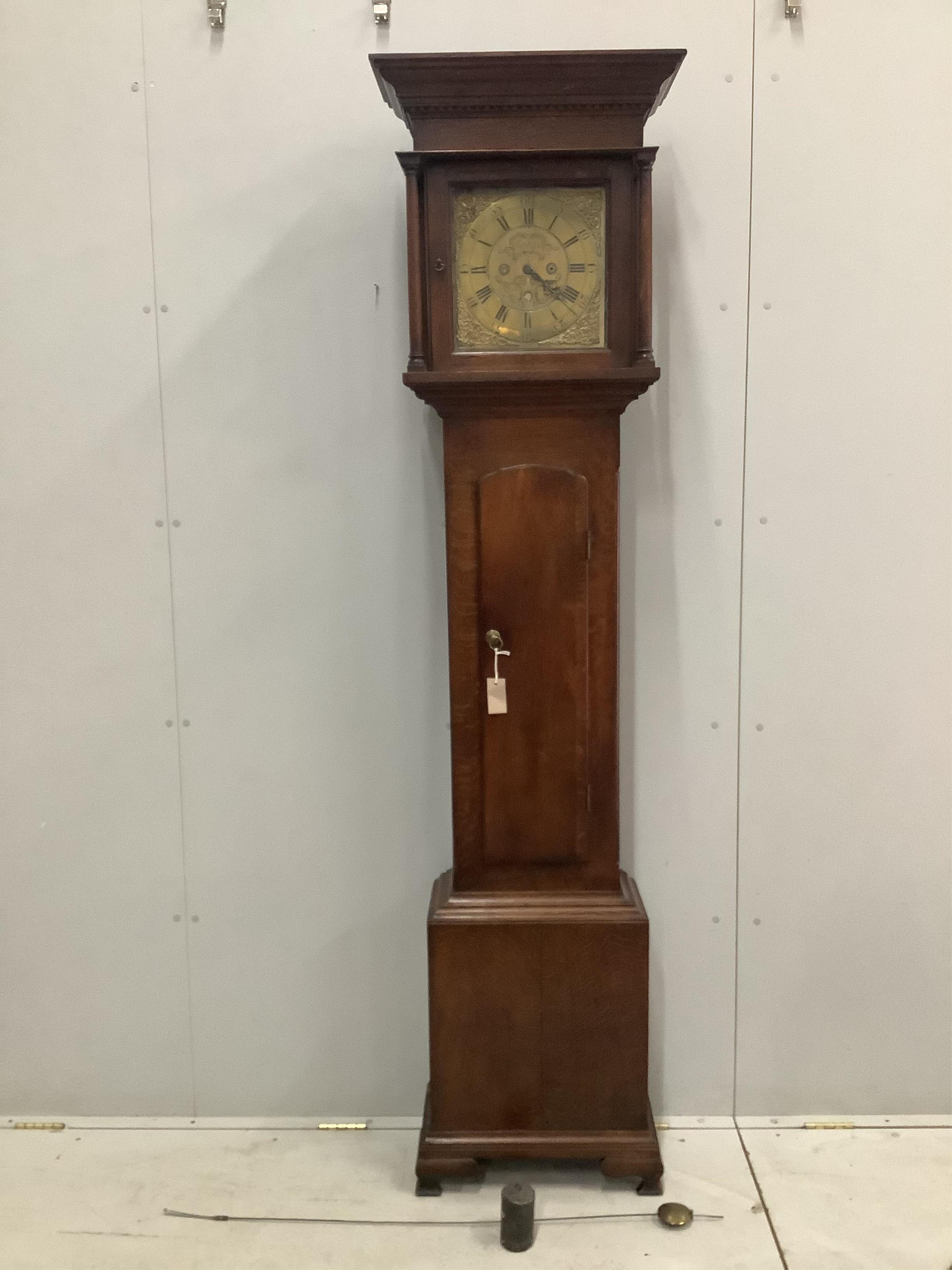 J N O Ivison. A George III oak cased thirty hour longcase clock with date aperture, height 214cm. Condition - good, not tested for timekeeping                                                                              