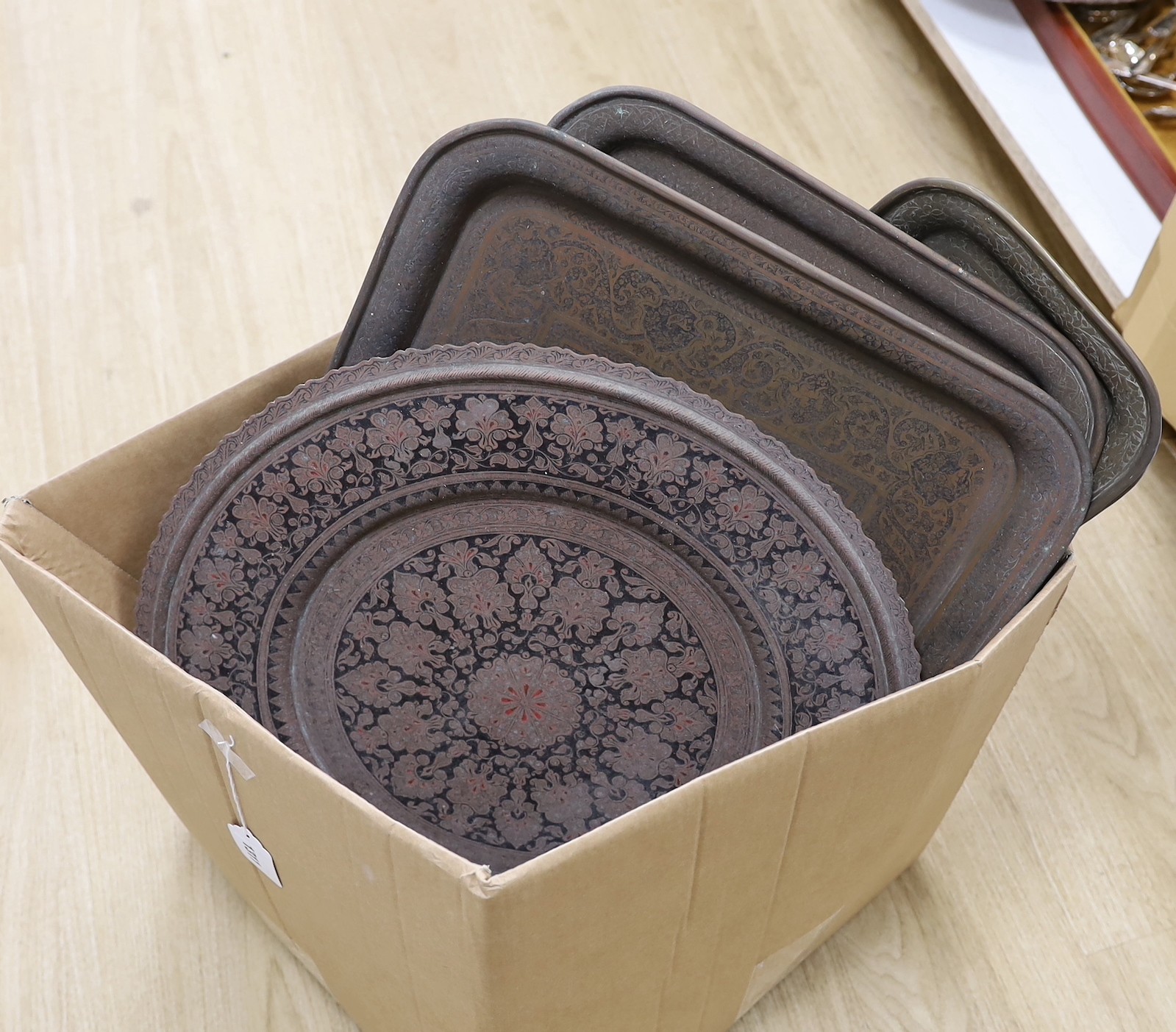 A group of assorted metalware including Indian and Persian trays                                                                                                                                                            