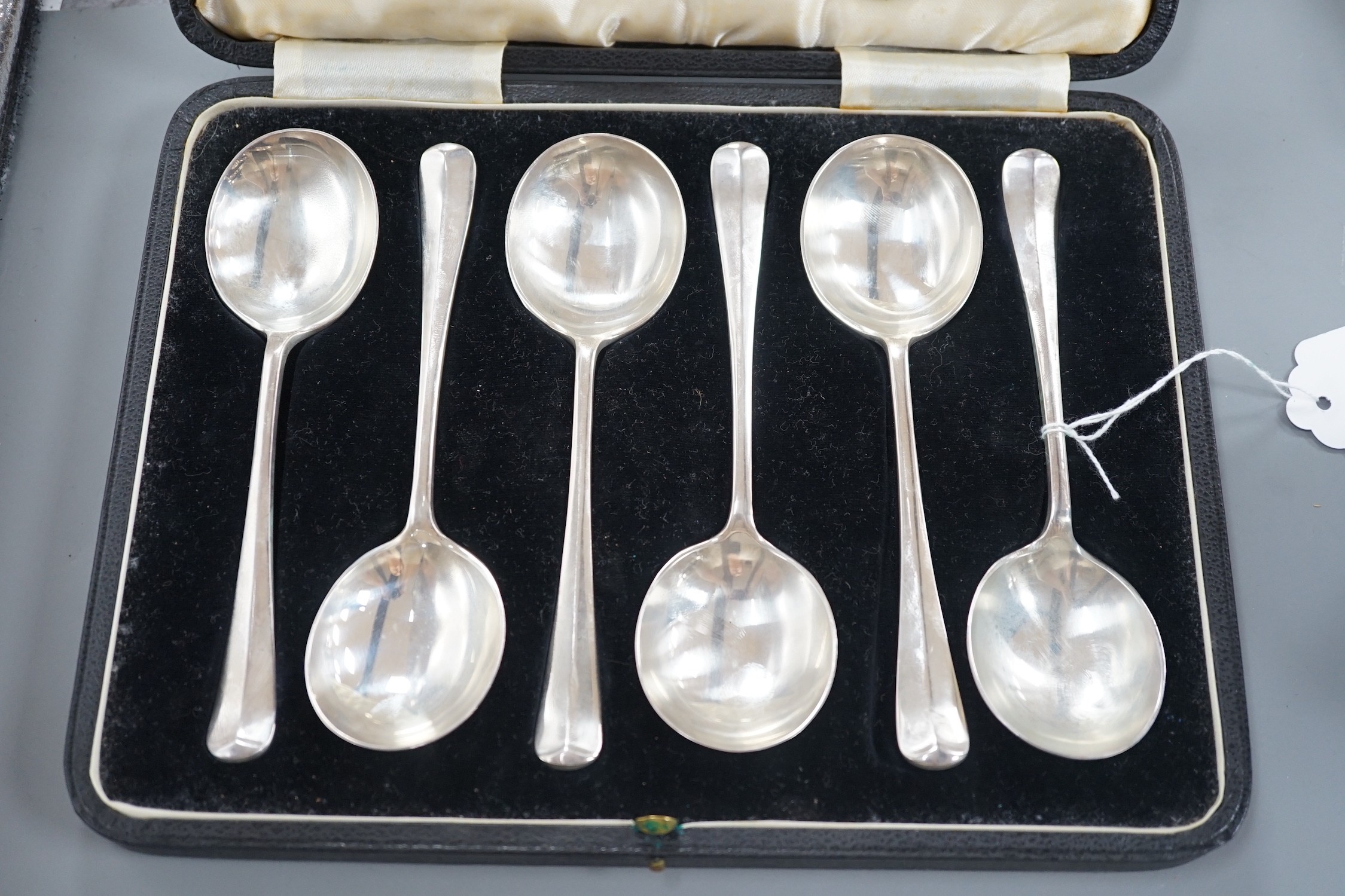 A cased set of six George V silver rat tail pattern soup spoons, Lee & Wigfull, Sheffield, 1935, 10.2oz.                                                                                                                    