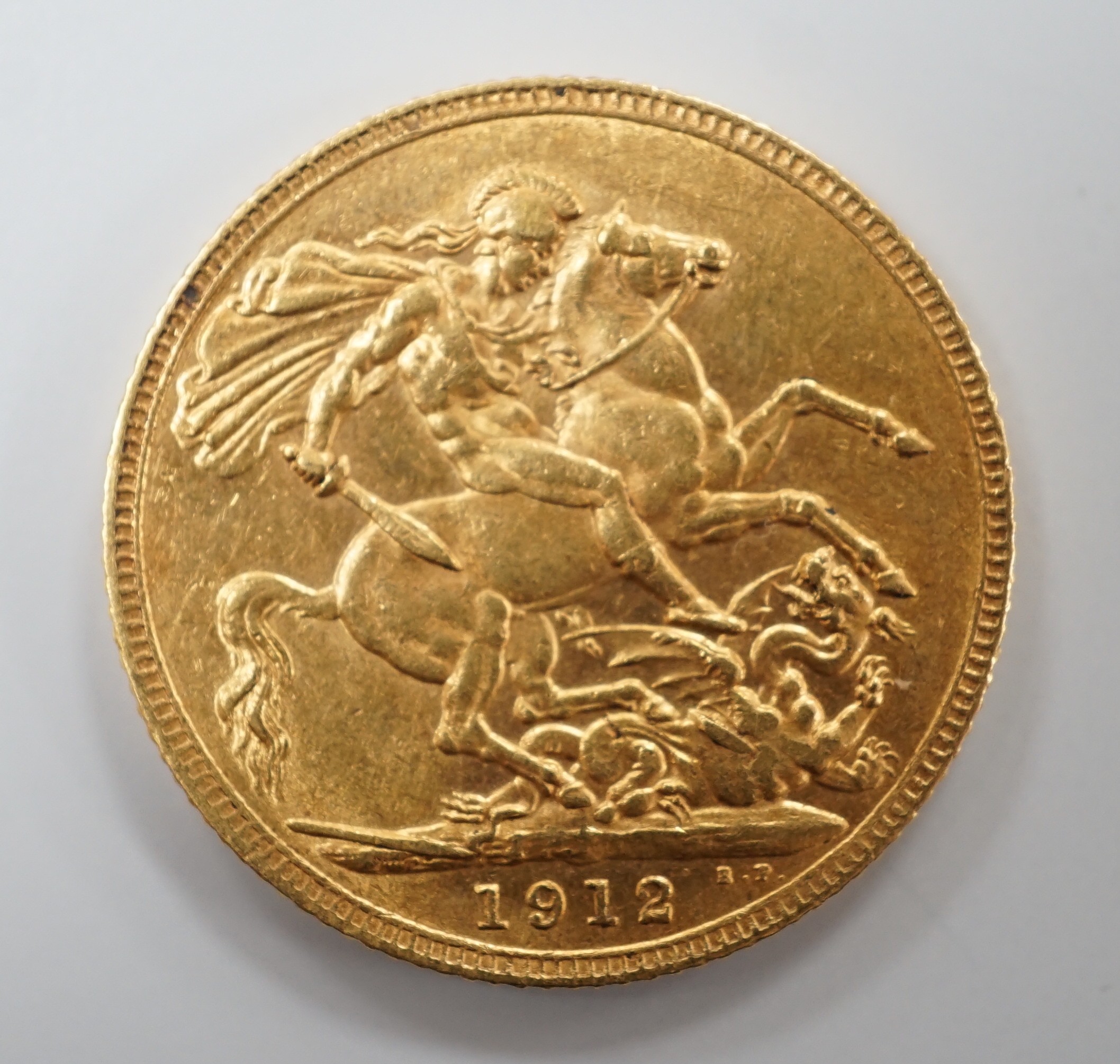 A George V 1912 gold sovereign.                                                                                                                                                                                             