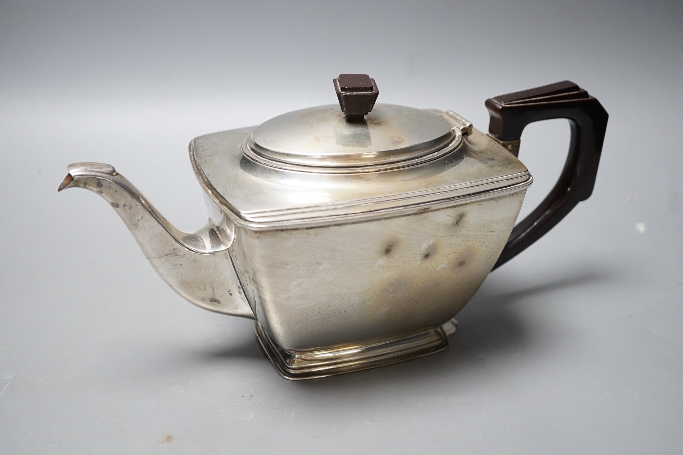 A George V Art Deco silver teapot, William Neale Ltd, Birmingham, 1935                                                                                                                                                      