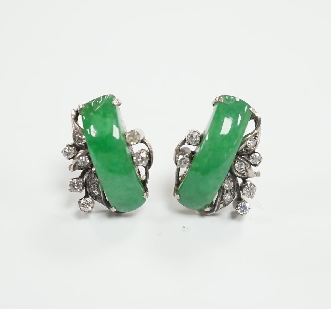 A pair of mid 20th century white metal, jade and diamond cluster set ear studs, 15mm, gross weight 4.6 grams.                                                                                                               