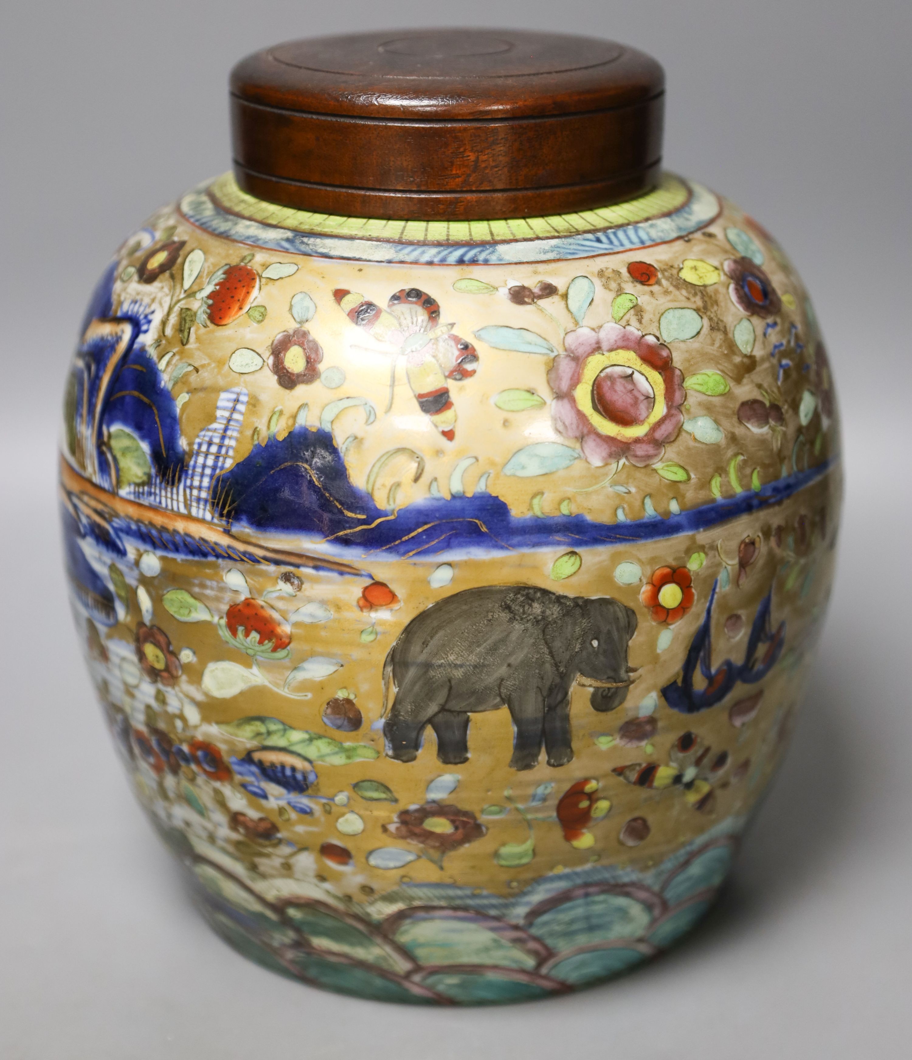 A 19th century Chinese clobbered jar with wood cover 24cm                                                                                                                                                                   