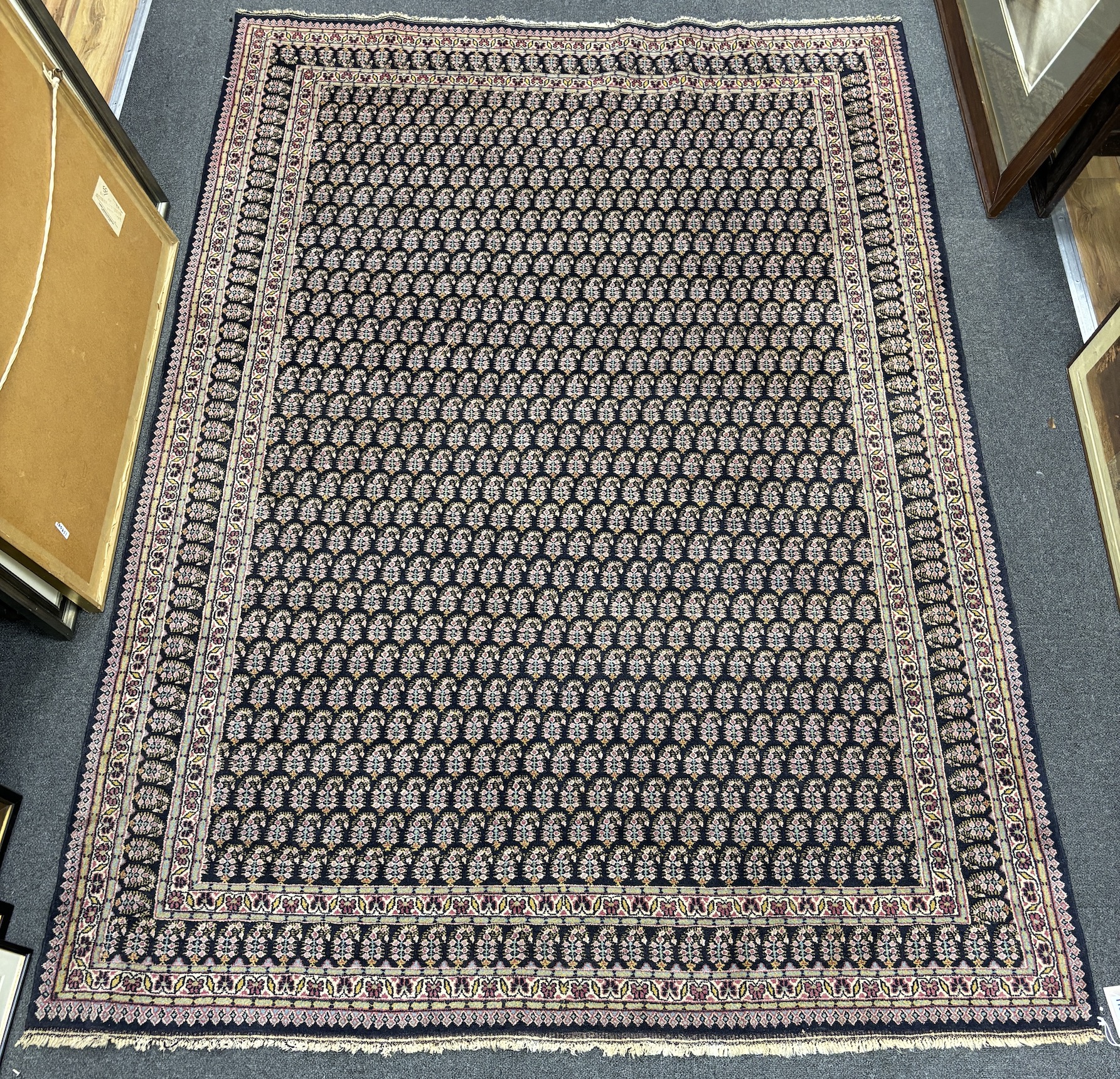 An antique Amritsar rug, 220 x 156cm                                                                                                                                                                                        