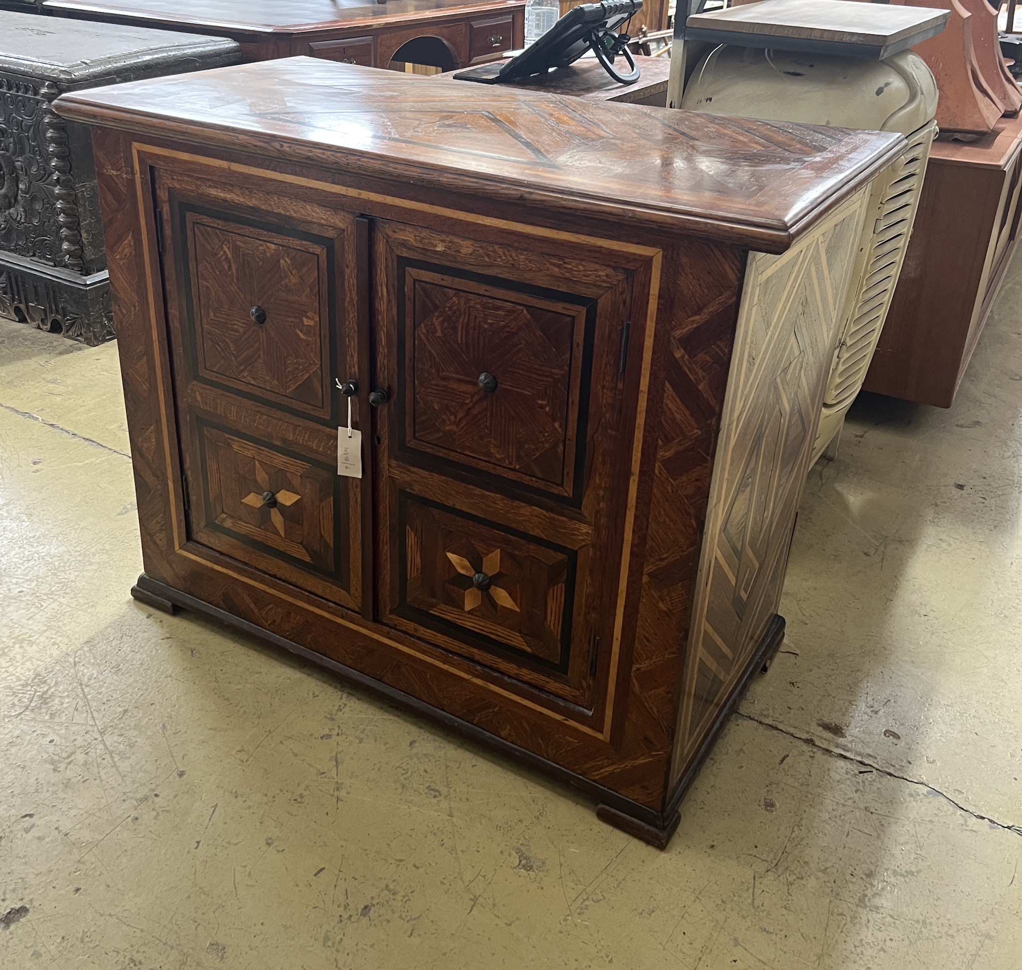 A 19th century Continental parquetry inlaid two door side cabinet, width 104cm, depth 52cm, height 85cm                                                                                                                     