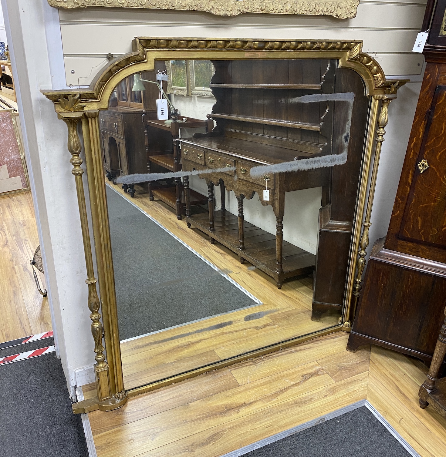 A Victorian giltwood and composition overmantel mirror, width 158cm, height 149cm                                                                                                                                           