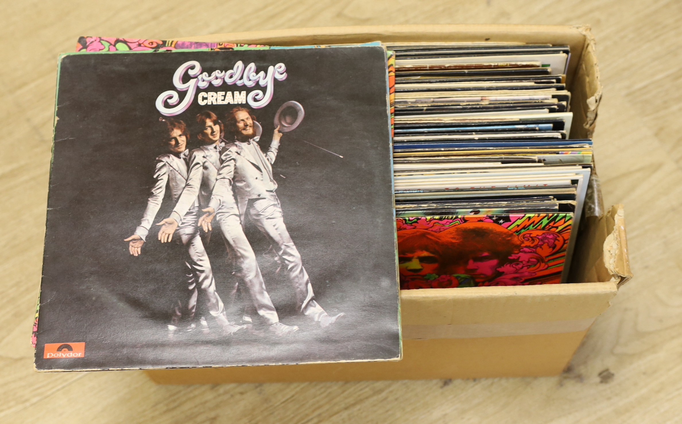 A box of 52 mixed rock and pop LP’s to include Cream, Small Faces, The Jam etc.                                                                                                                                             