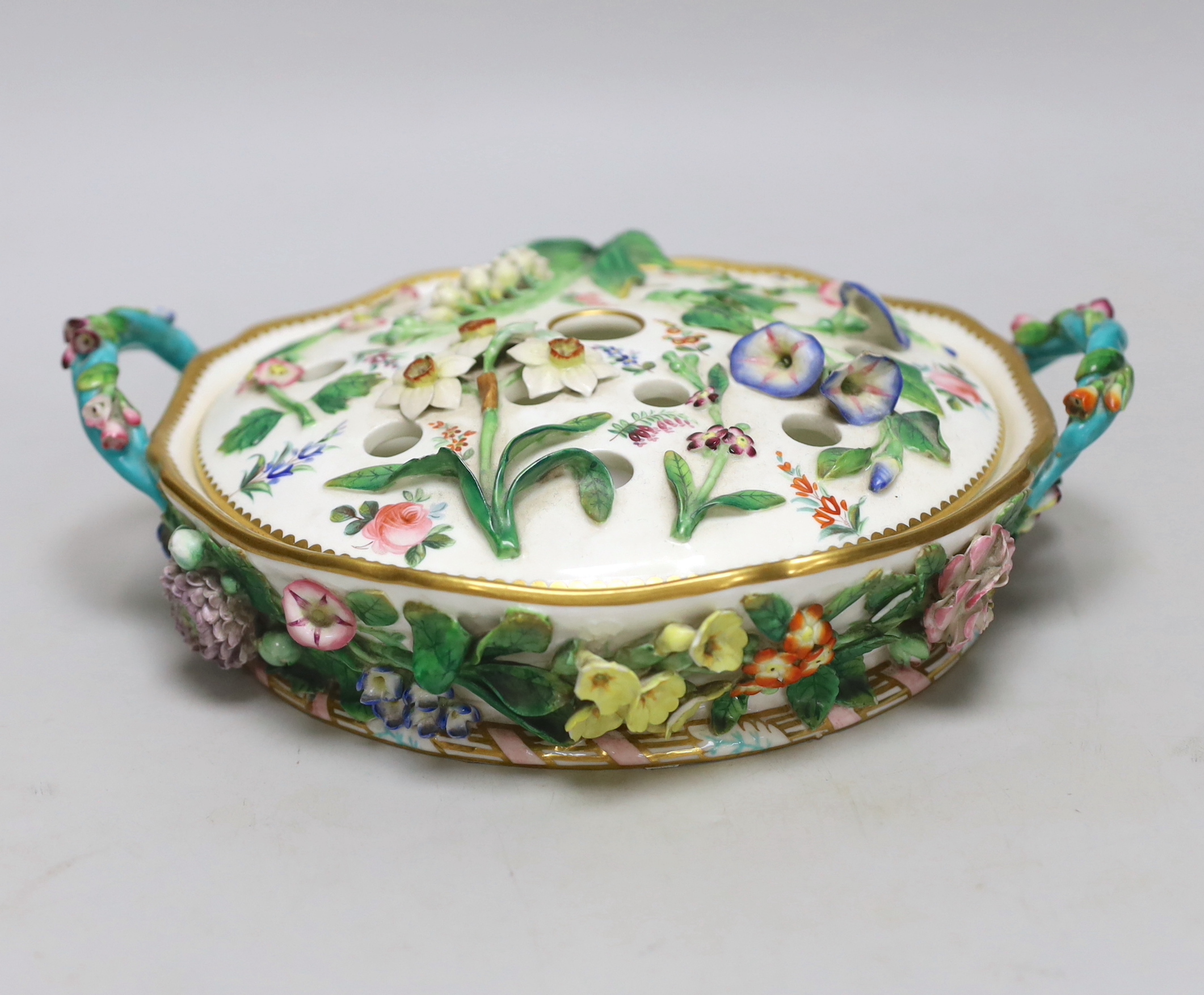 A Minton potpourri bowl and cover, c.1830, with applied floral decoration, 25cm wide                                                                                                                                        