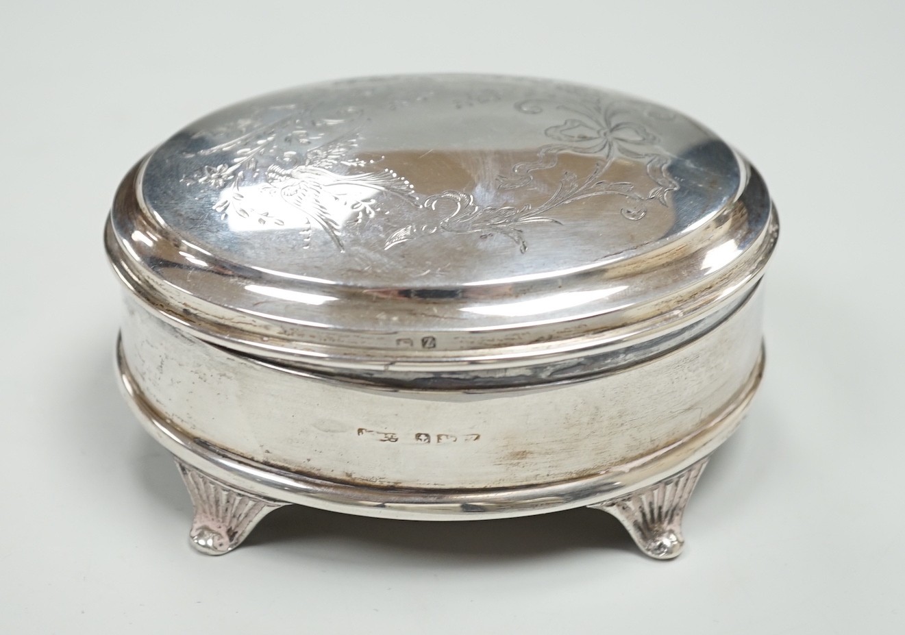 A George V engraved silver mounted oval trinket box, Joseph Gloster Ltd?, Birmingham, 1924, 10.1cm.                                                                                                                         