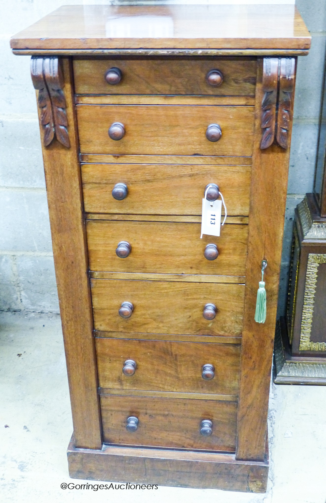 A Victorian walnut Wellington chest, width 48cm, depth 35cm, height 104cm                                                                                                                                                   
