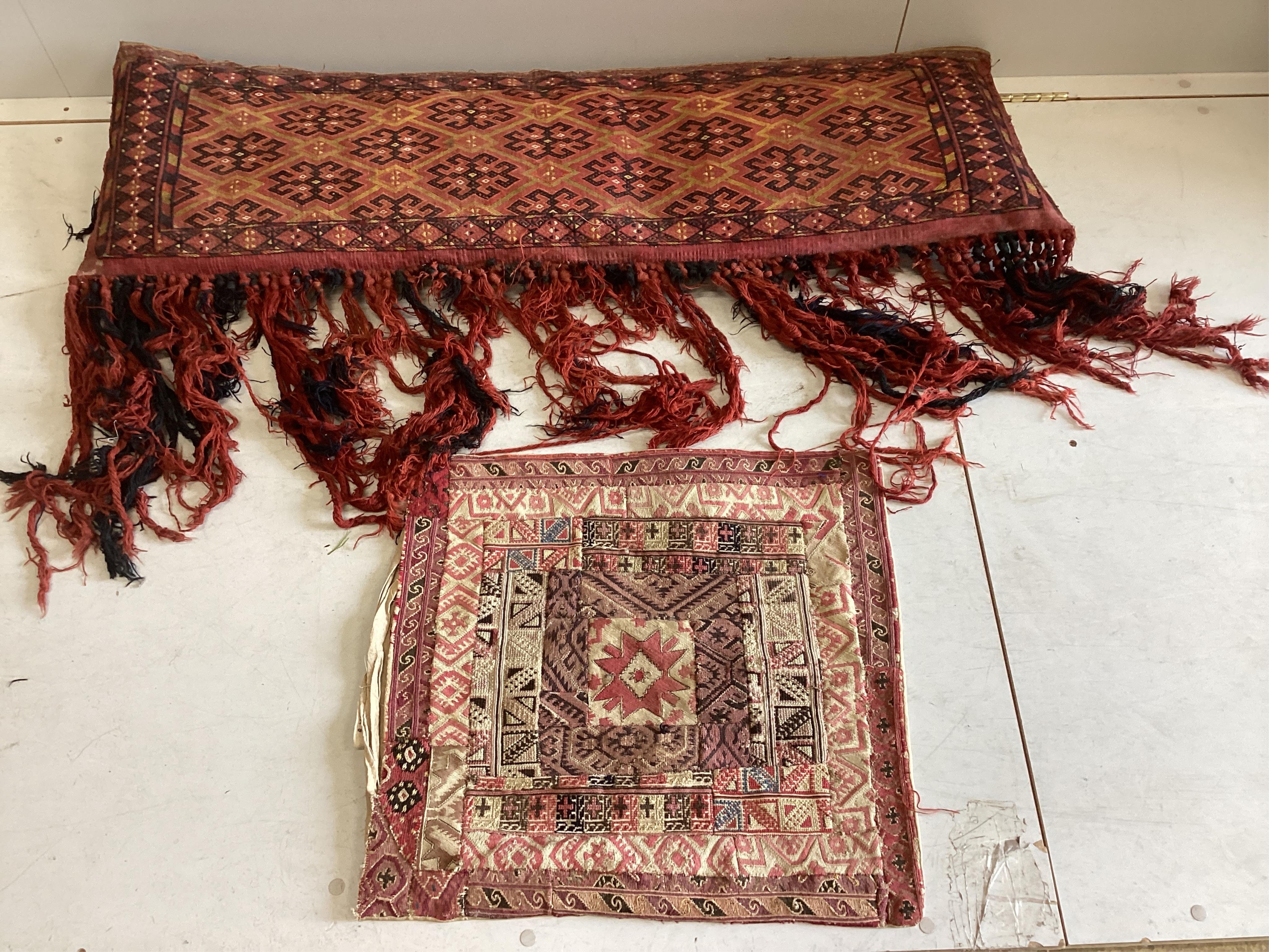 An antique Turkomen Kilim hanging and a patchwork bag face, larger width 128cm. Condition - fair                                                                                                                            