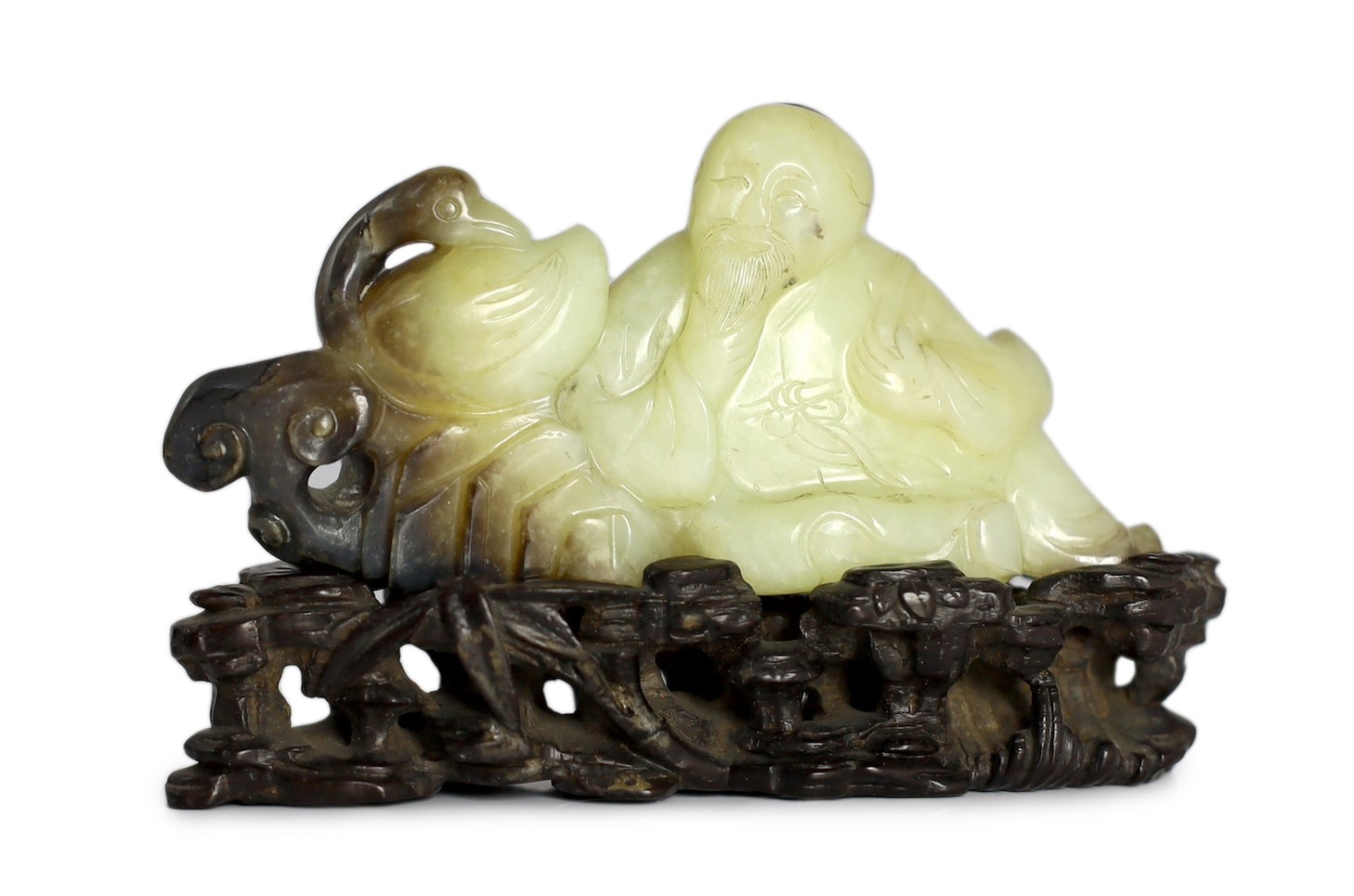 A Chinese white and black jade group of the calligrapher Wang Xizhi seated by a goose, 18th century, 9.7cm across, carved zitan wood stand                                                                                  