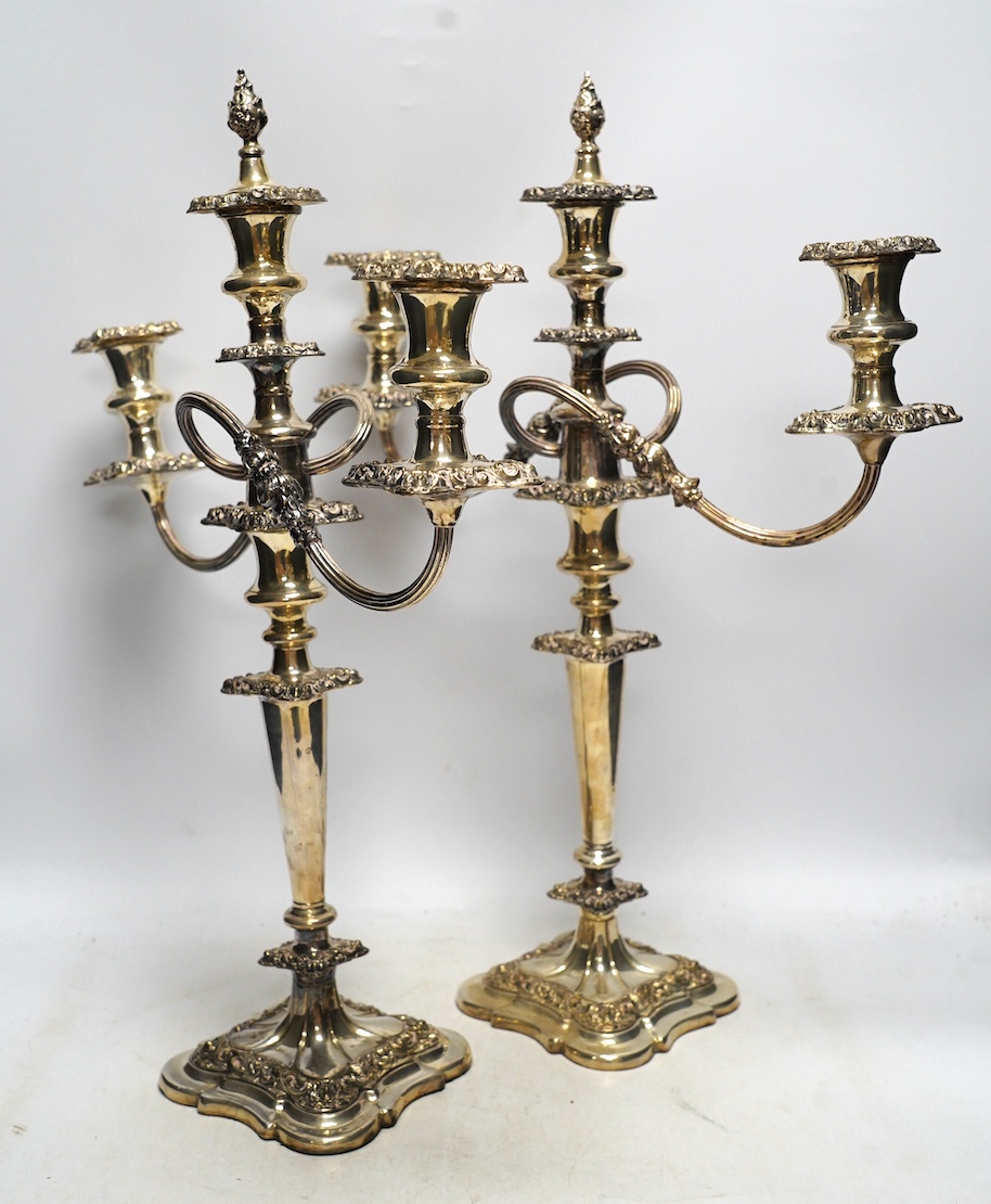 A pair of EPNS candelabra, 52cm high. Condition - fair to good                                                                                                                                                              