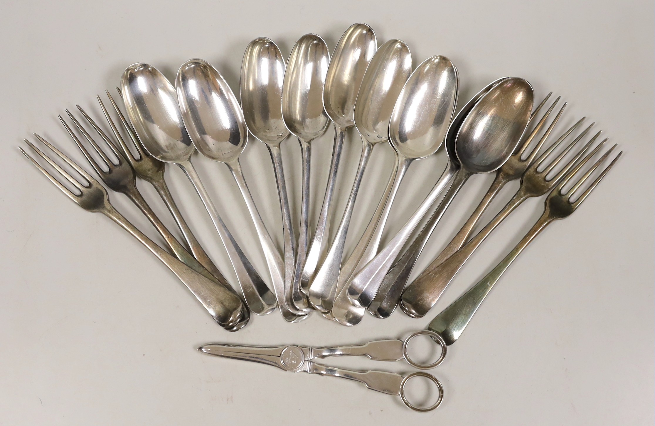 A set of seven George I silver Hanovarian rat tail pattern table spoons, Henry Clarke I, London, 1725, 19.9cm, a set of six George II silver Hanovarian pattern three pronged table forks, Isaac Callard, London, 1733, 19.2