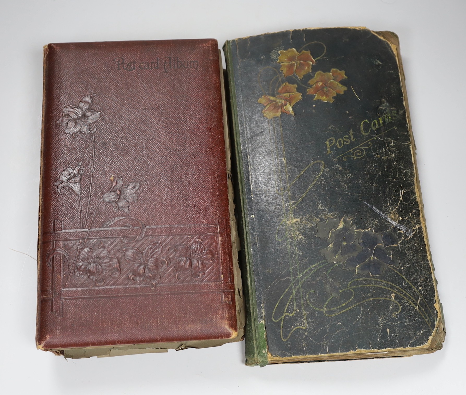 Two albums of Edwardian and later postcards                                                                                                                                                                                 