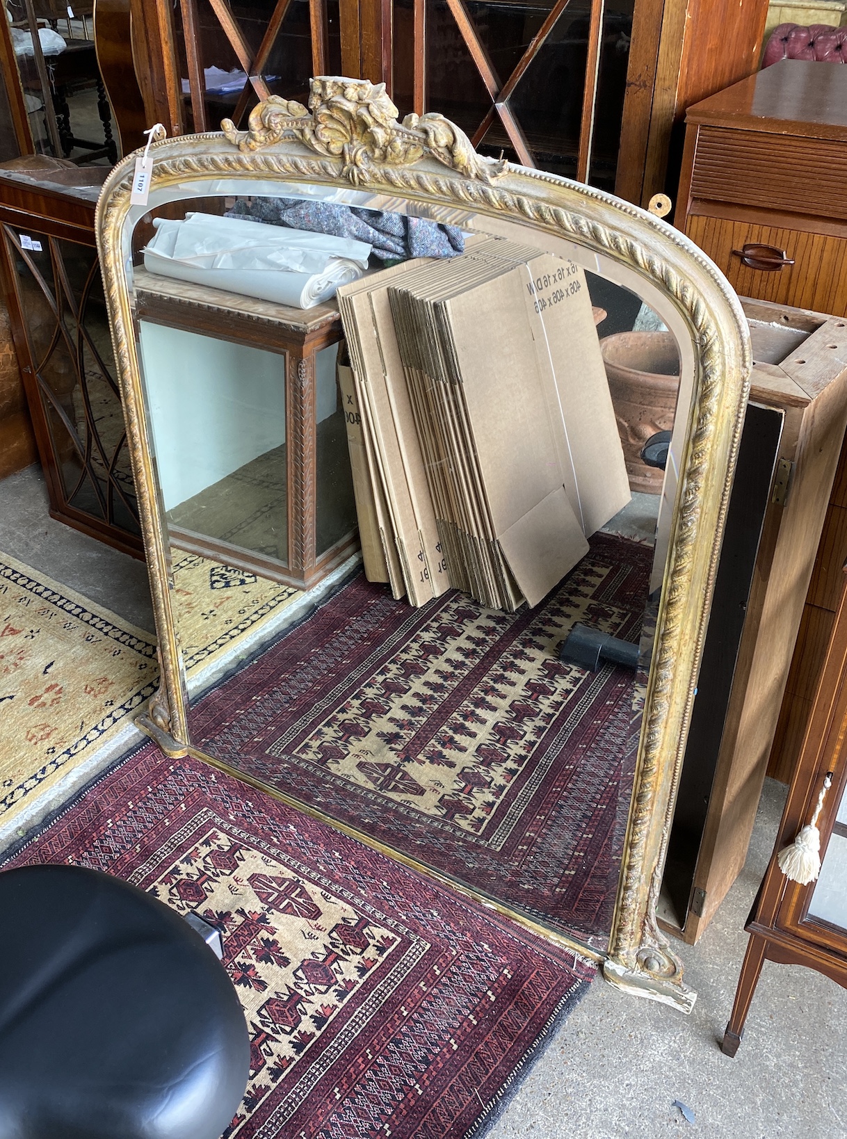 A Victorian giltwood and composition overmantel mirror, width 130cm, height 140cm                                                                                                                                           