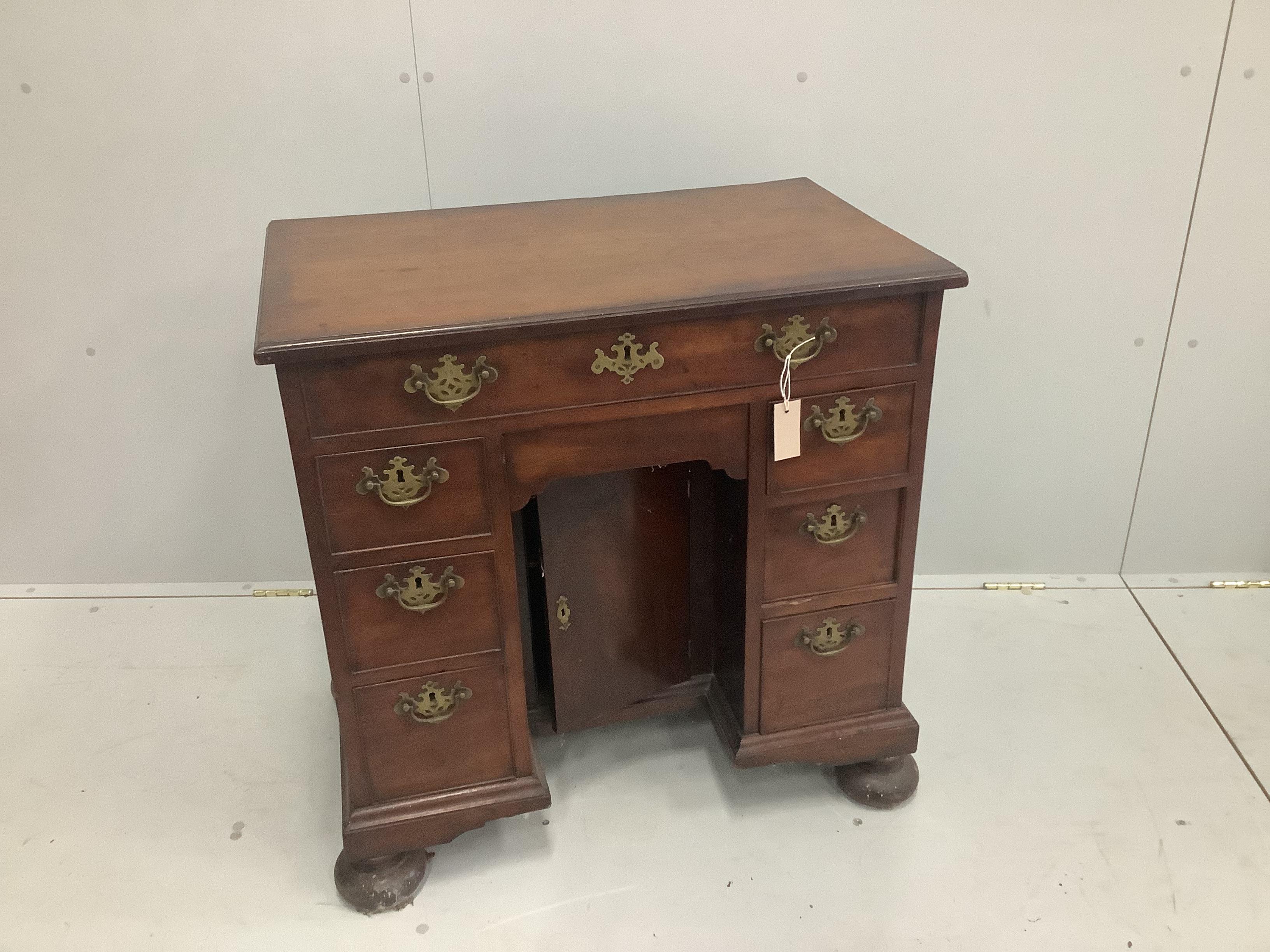 A George III mahogany kneehole desk, width 78cm                                                                                                                                                                             