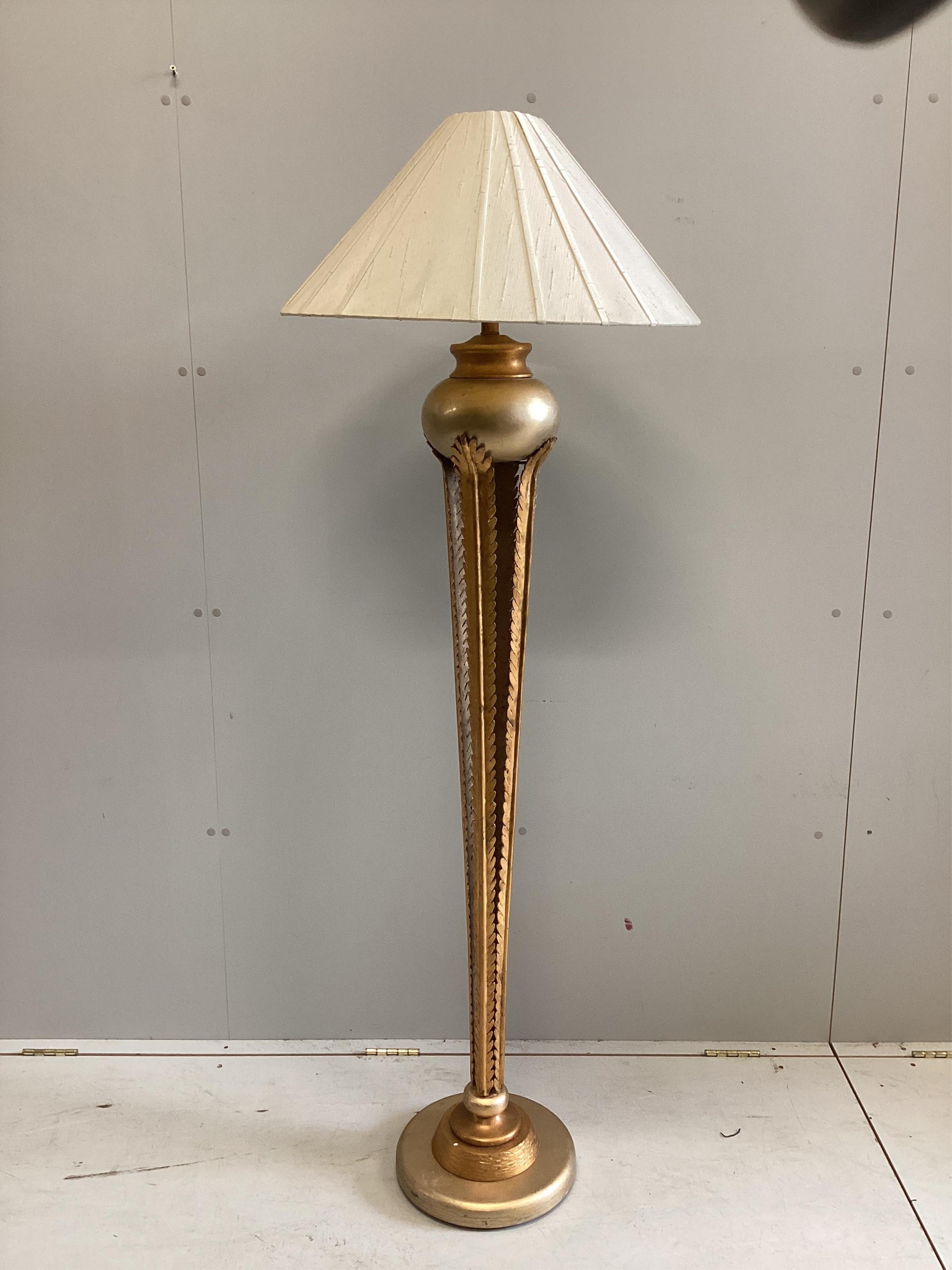 A Contemporary Grecian style gilt metal mounted standard lamp, height including shade 106cm. Condition - good                                                                                                               