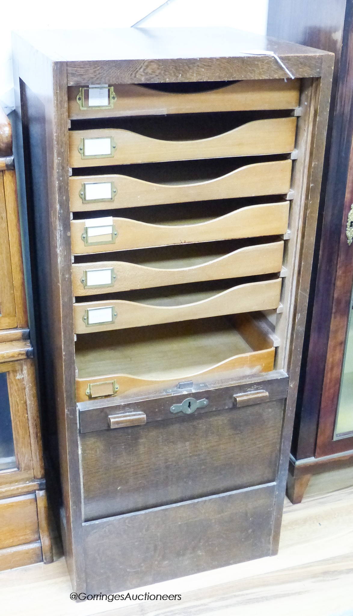 An early 20th century oak tambour filing cabinet, width 45cm, depth 43cm, height 104cm                                                                                                                                      