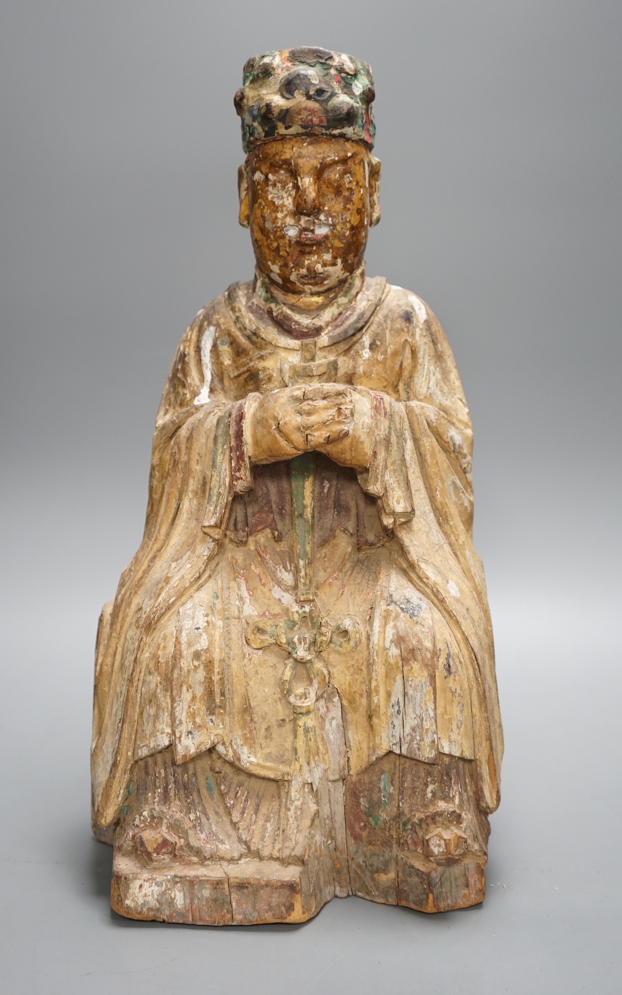 A large Chinese polychrome wood figure of the Jade Emperor, Qing dynasty                                                                                                                                                    