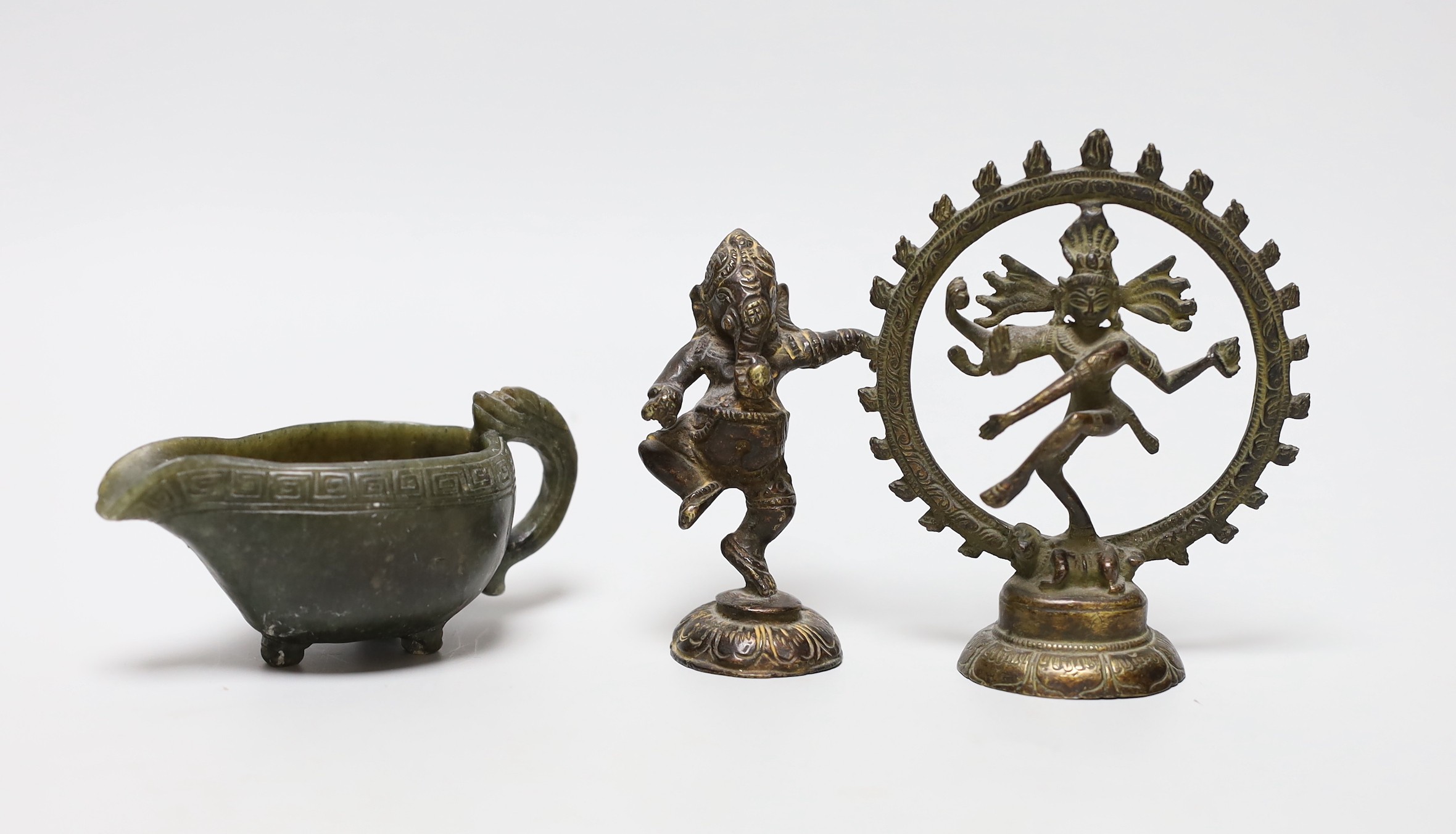 Two Indian bronze deity figures together with a Chinese carved spinach jade jug, tallest 11cm                                                                                                                               