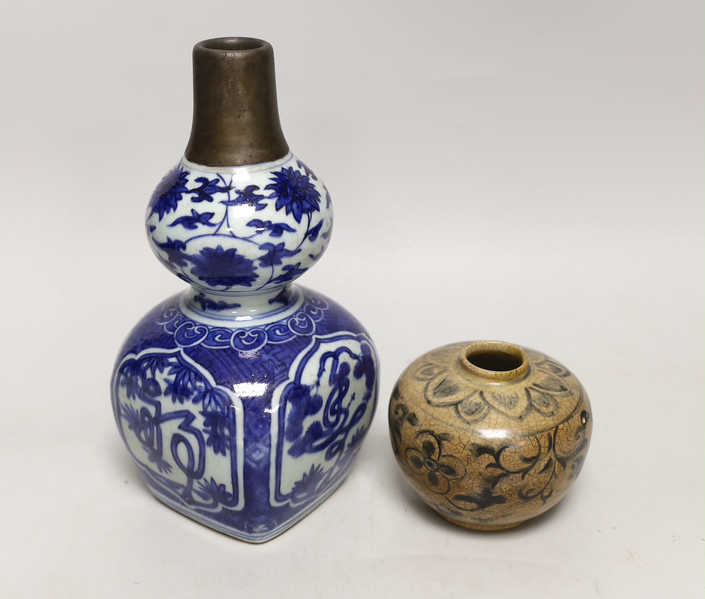 A Chinese blue and white double gourd vase and a smaller crackle glaze jar, tallest 23cm                                                                                                                                    