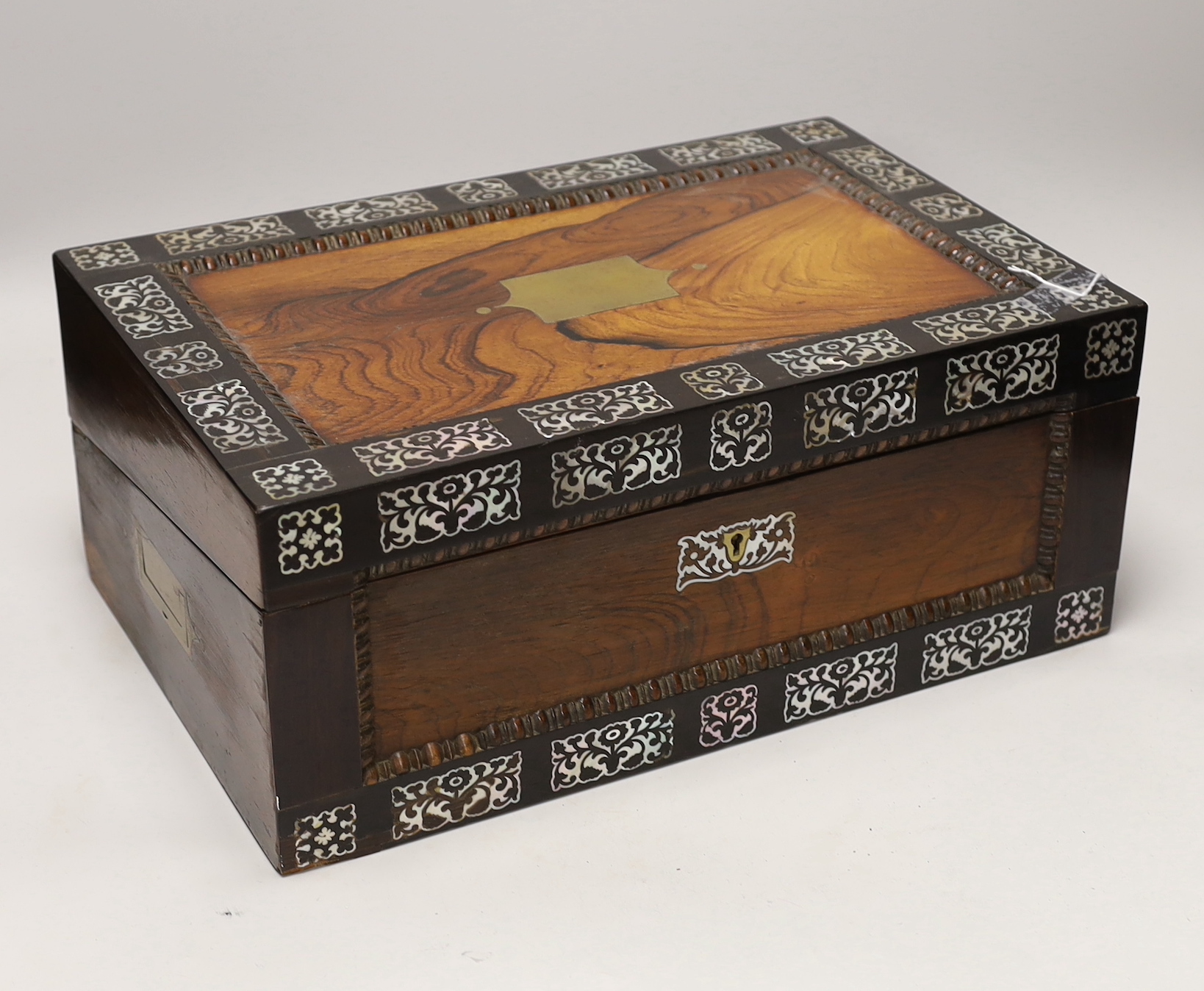 A Victorian rosewood, mother of pearl inlaid, writing slope, 40.5cm wide, 26.5cm deep, 17cm high                                                                                                                            