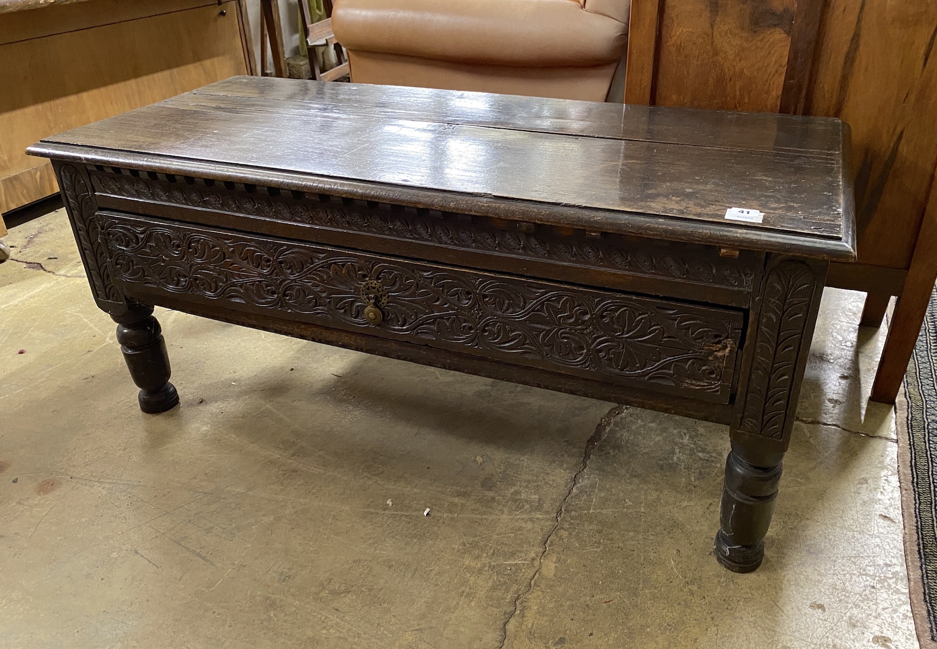A 19th century carved oak hall bench, (adapted), width 120cm, depth 51cm, height 54cm                                                                                                                                       