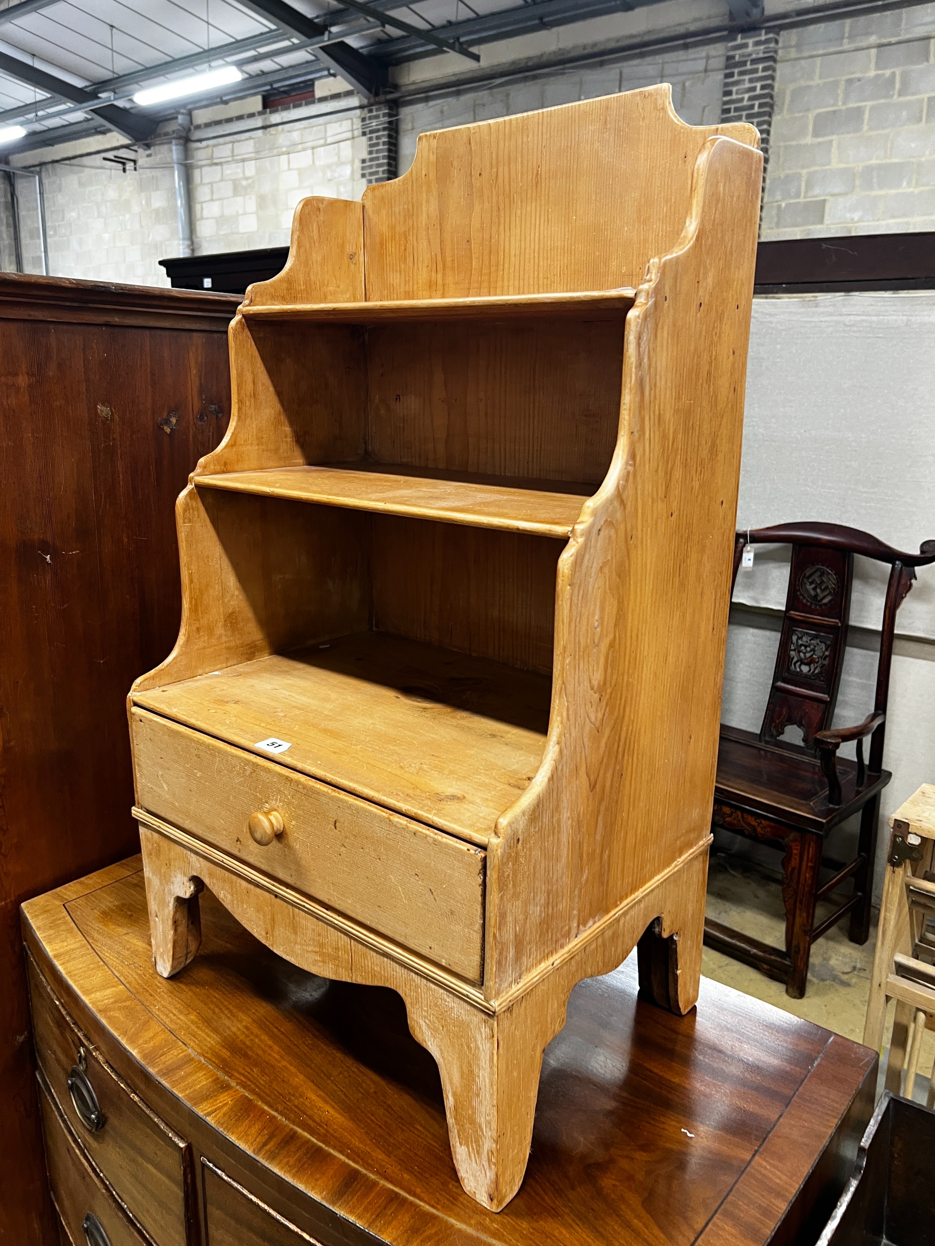 A small 19th centurty pine graduated open bookcase, length 49cm, depth 35cm, height 90cm                                                                                                                                    