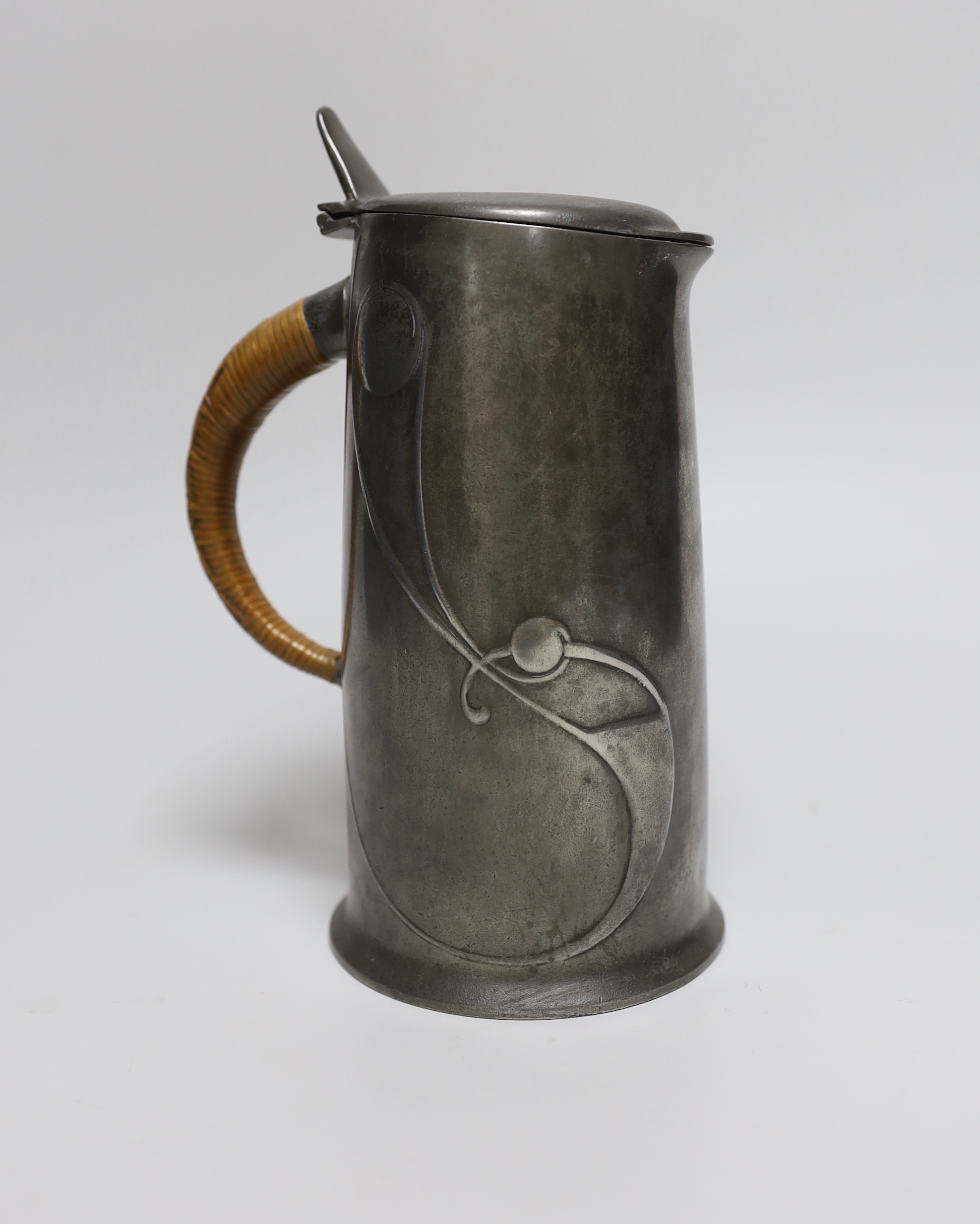 Archibald Knox for Liberty and Co., an Arts and Crafts Tudric pewter jug, model 0305, 15.5cm                                                                                                                                