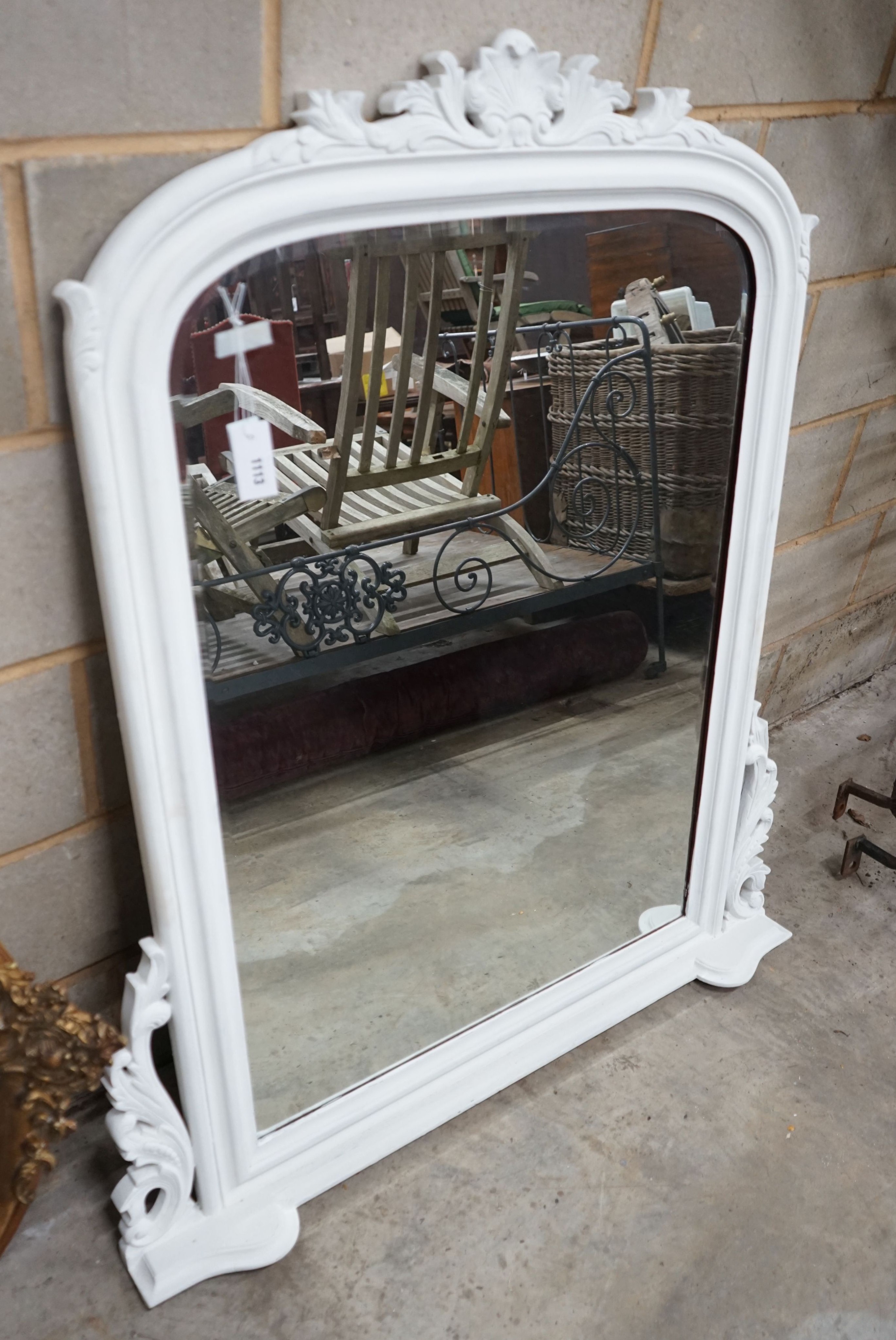 A Victorian style overmantel mirror, later white painted, width 110cm, height 126cm                                                                                                                                         
