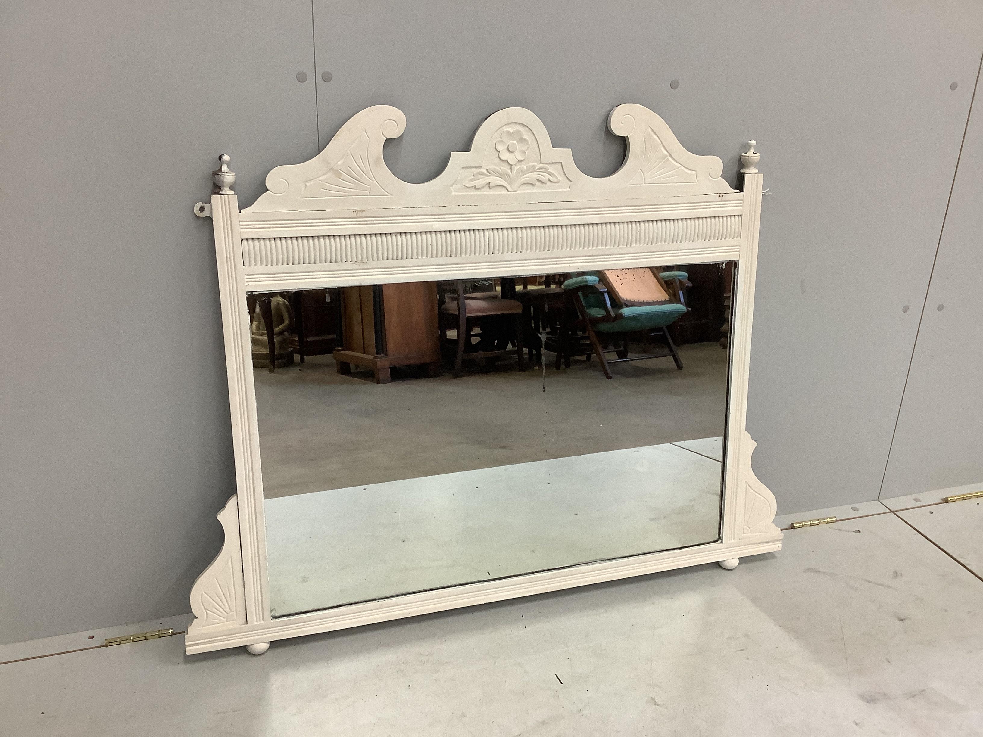 A late Victorian overmantel mirror (later painted), width 112cm, height 87cm                                                                                                                                                