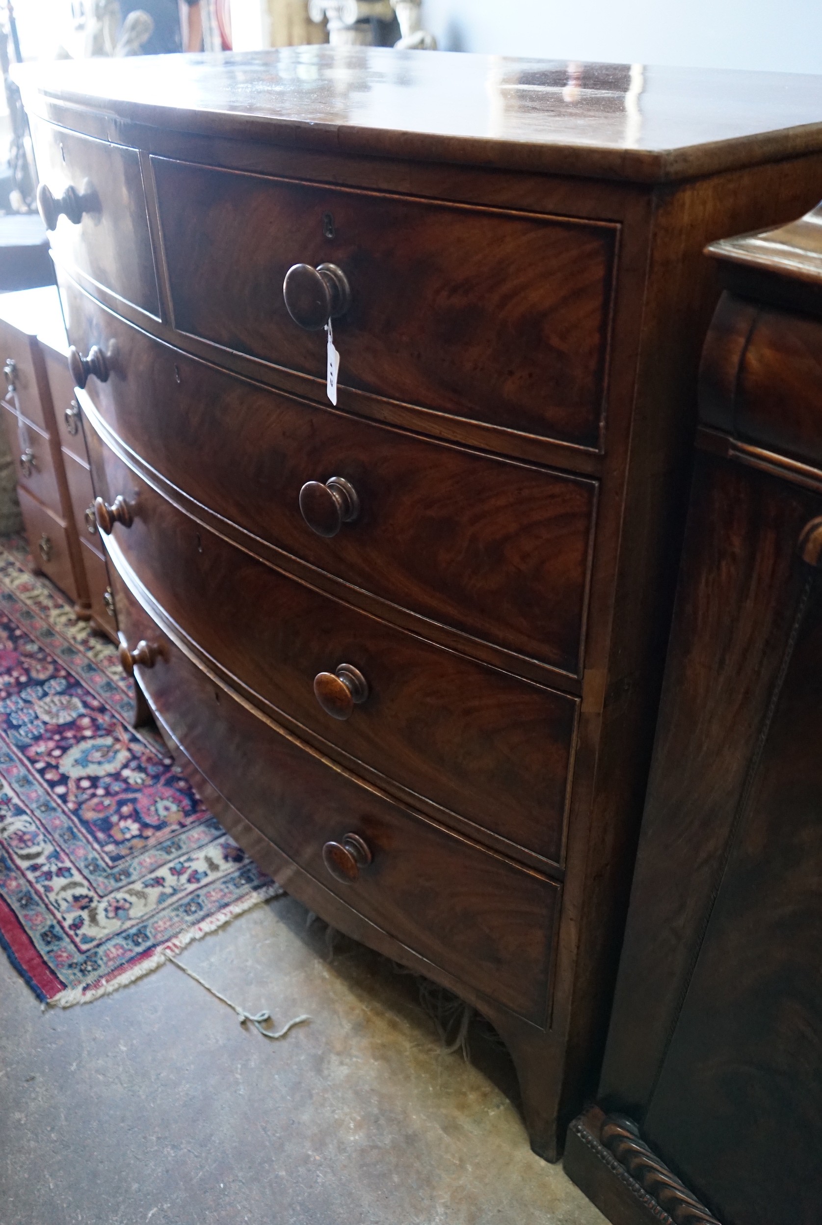 A 19th century mahogany bow-fronted chest of drawers, width 107cm, depth 59cm, height 108cm                                                                                                                                 