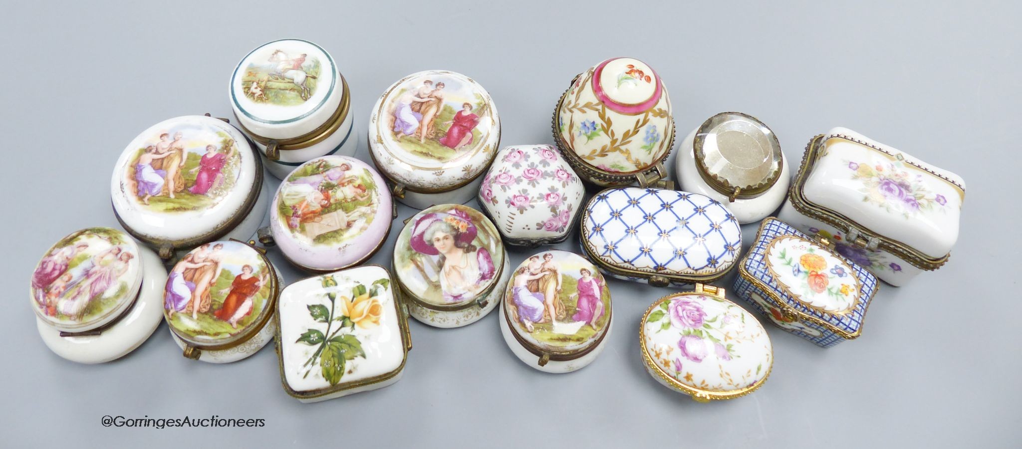 Sixteen porcelain pill boxes                                                                                                                                                                                                