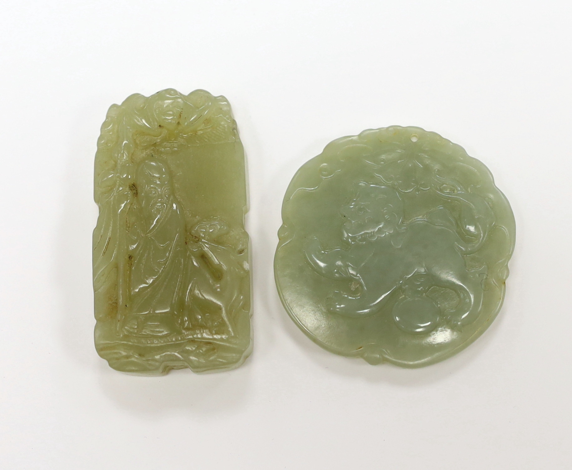 Two Chinese carved jade pendants, largest 6cm                                                                                                                                                                               