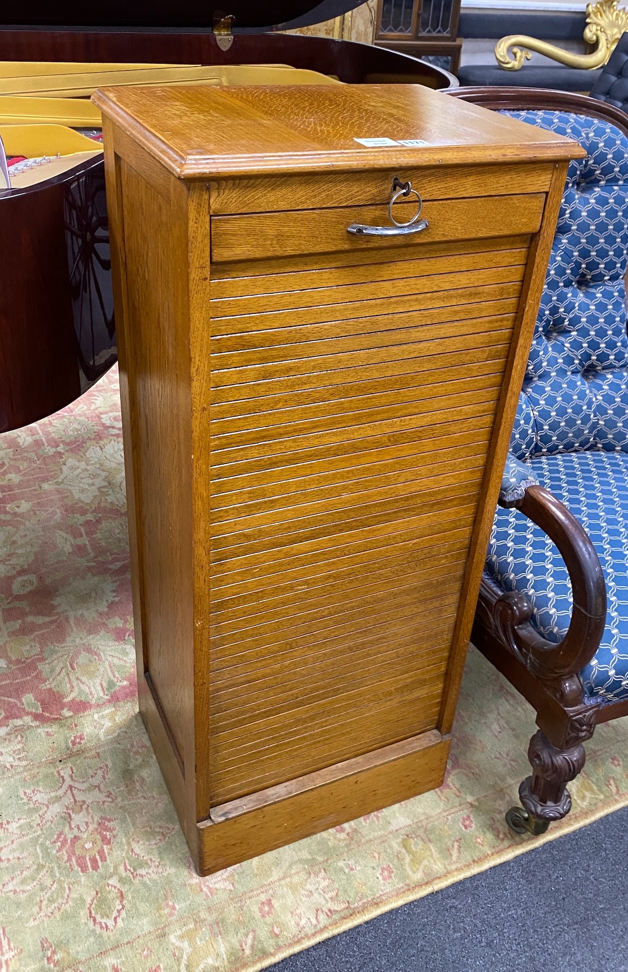 A mid 20th century oak tambour filing cabinet, width 47cm, depth 36cm, height 110cm                                                                                                                                         