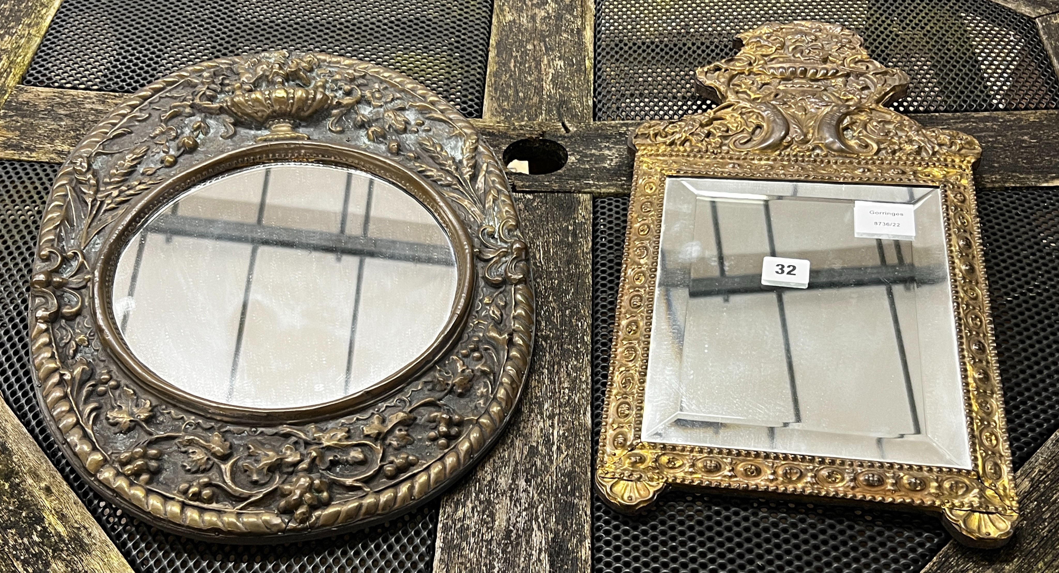 Two small 19th century French embossed brass wall mirrors, larger height 51cm                                                                                                                                               