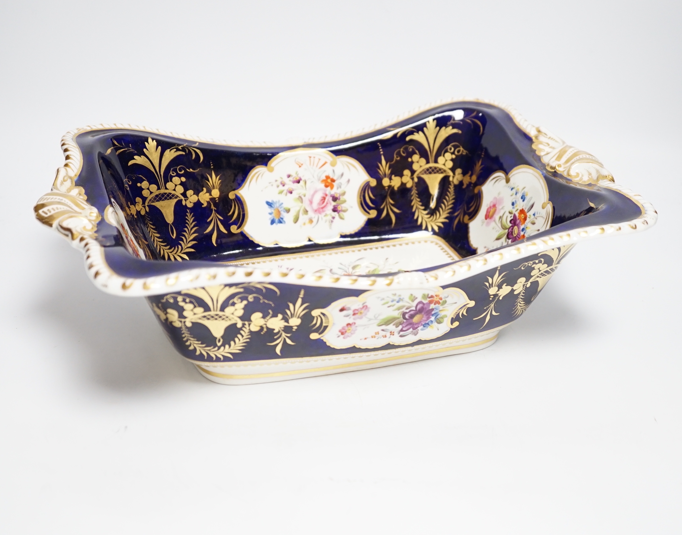 A Derby flower painted bread dish c.1810, 33cm wide                                                                                                                                                                         