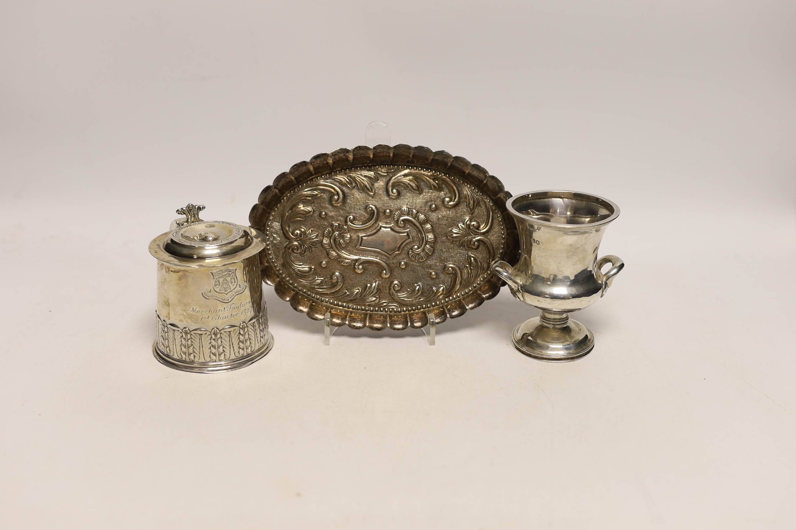 A George V miniature tankard with engraved inscription to commemorate the 'Merchant Taylors Co, 1st Charter, 1327', Daniel & John Welby, London, 1927, 85mm, together with a William IV silver small campana shaped vase and