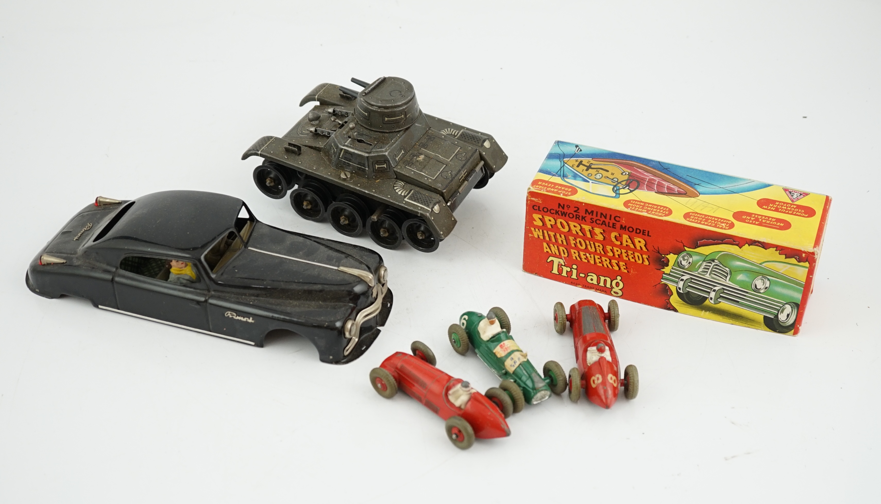 Eleven tinplate and diecast vehicles by Dinky Toys, Tri-ang, Gama, etc., including a Primal Arnold tinplate remote controlled car, a Tri-ang Minic Sports car with four speeds, a Gama Montage Tank, a Tri-ang Minic Armoure