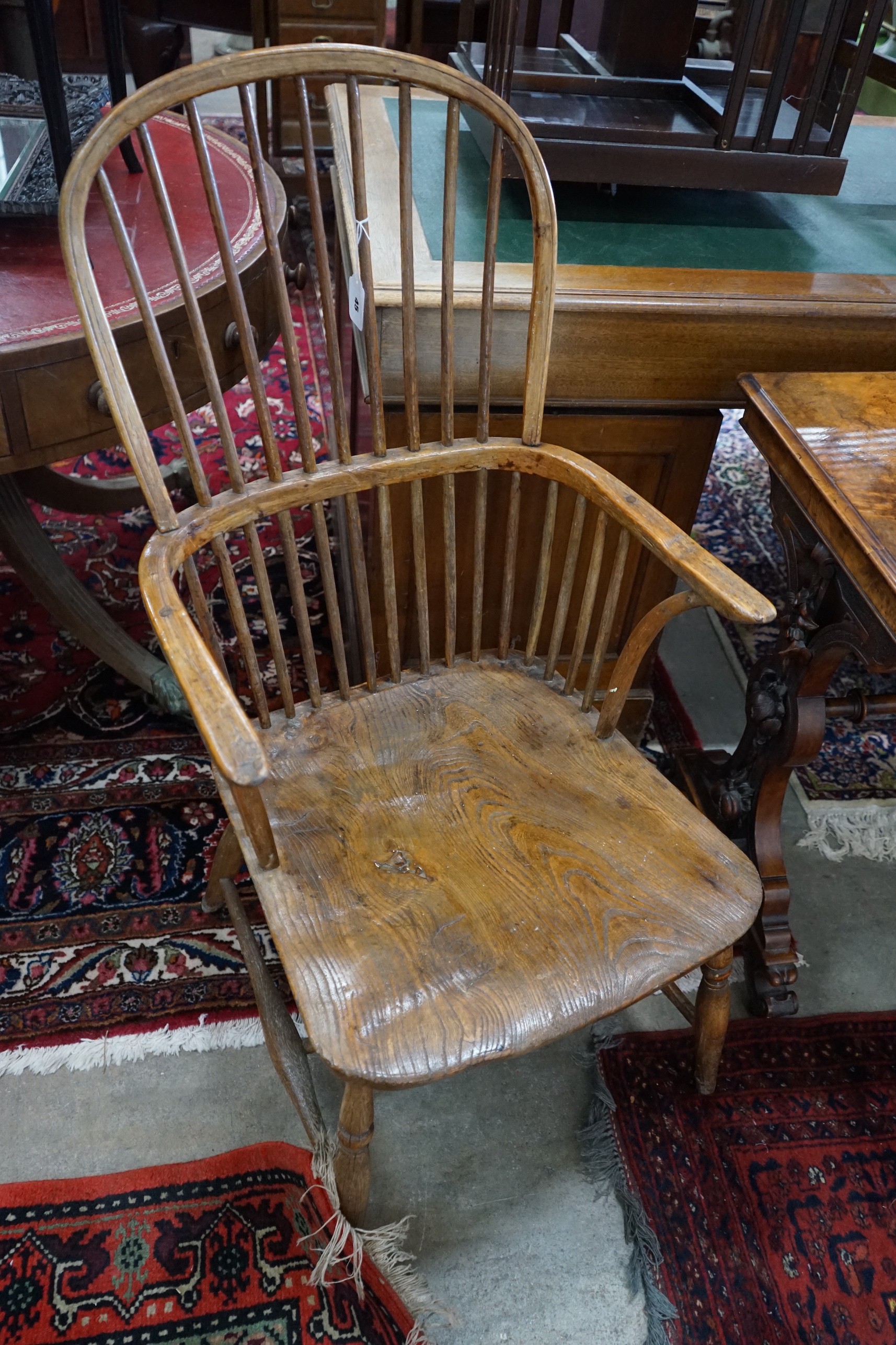 A 19th century ash and elm Windsor comb back armchair, width 54cm, depth 50cm, height 105cm                                                                                                                                 