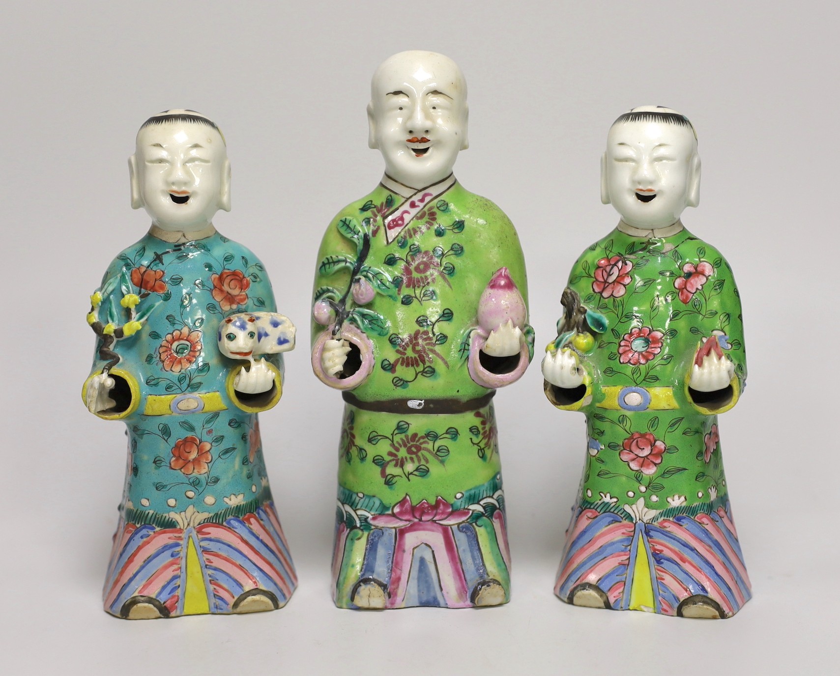 A near pair of Chinese polychrome-decorated figural incense burners and another similar incense burner, Jiaqing period (1796-1820), tallest 20.5cm                                                                          