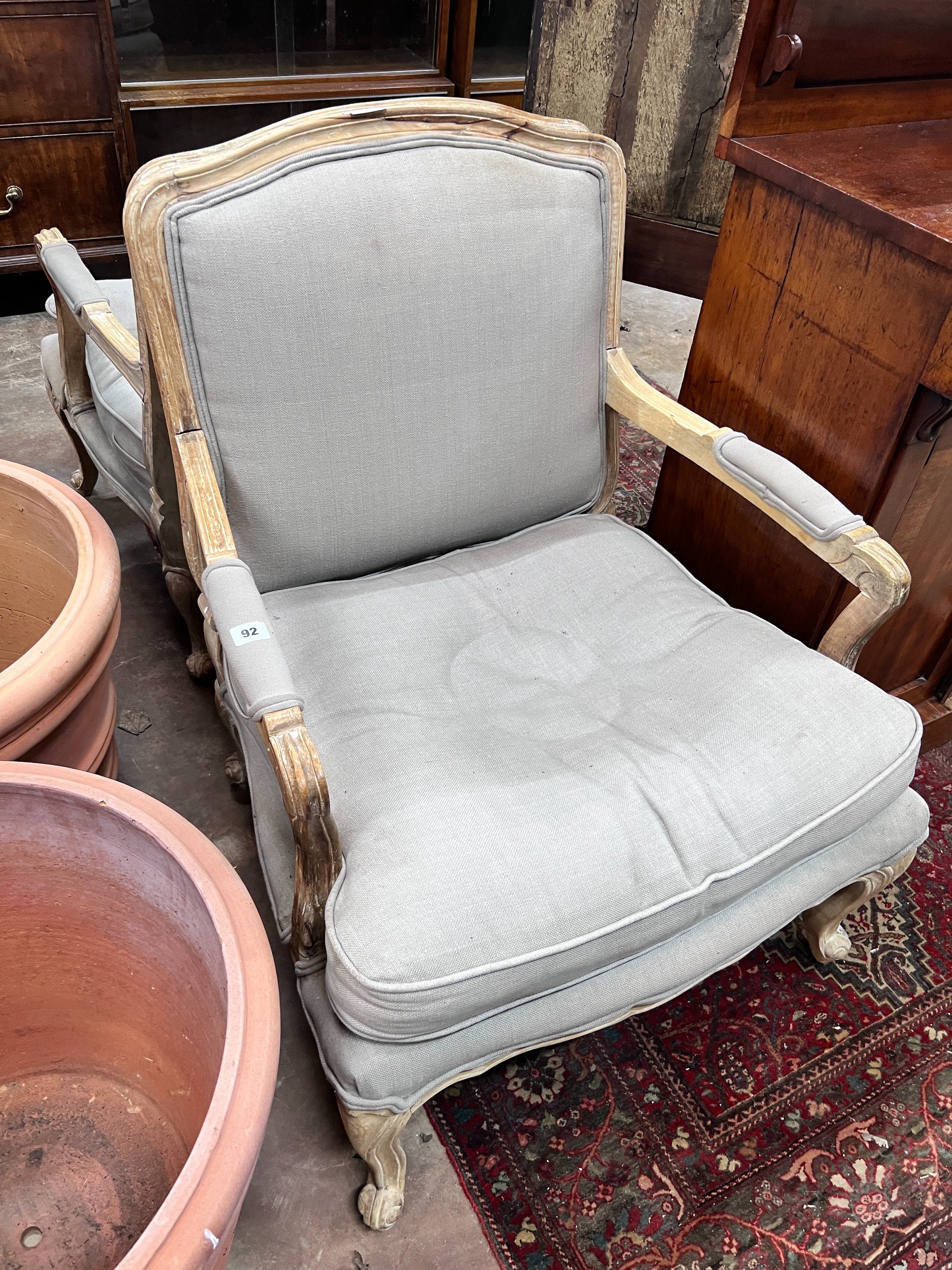A pair of Louis XVI style upholstered open armchairs, width 68cm, depth 70cm, height 88cm *Please note the sale commences at 9am.                                                                                           