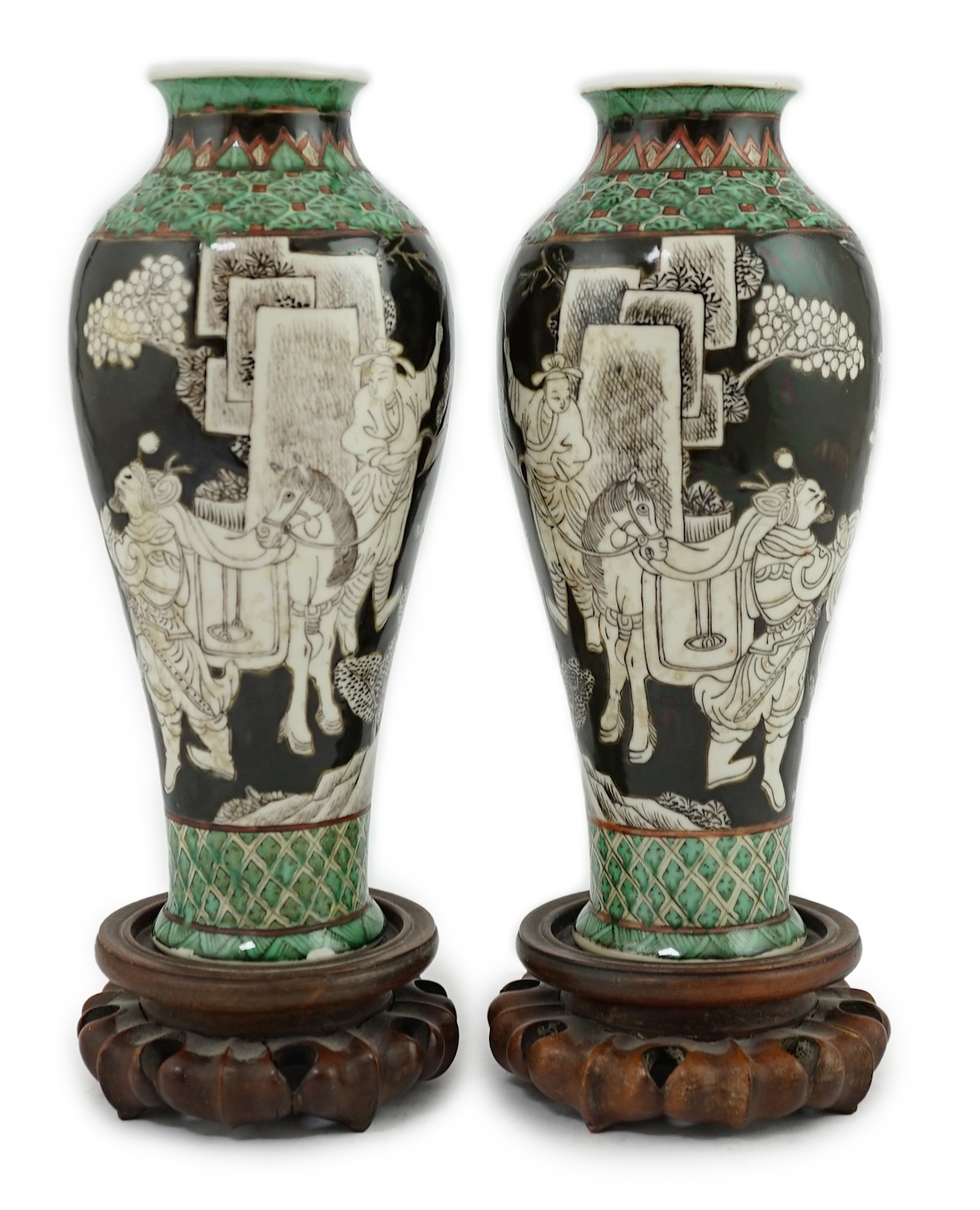 A pair of Chinese black ground enamelled porcelain baluster vases, late 19th century                                                                                                                                        