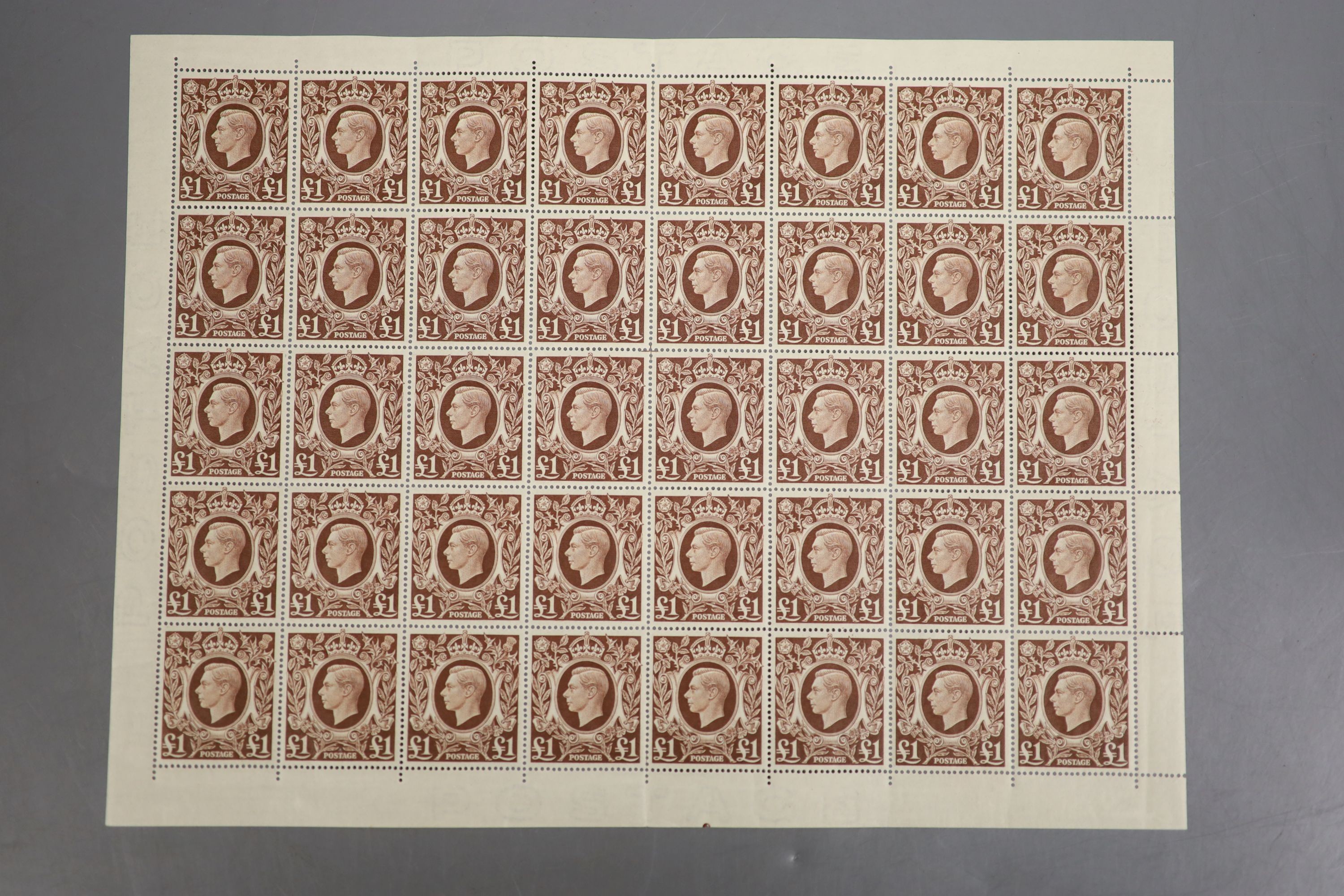 One sheet of 40 George VI £1 stamps                                                                                                                                                                                         